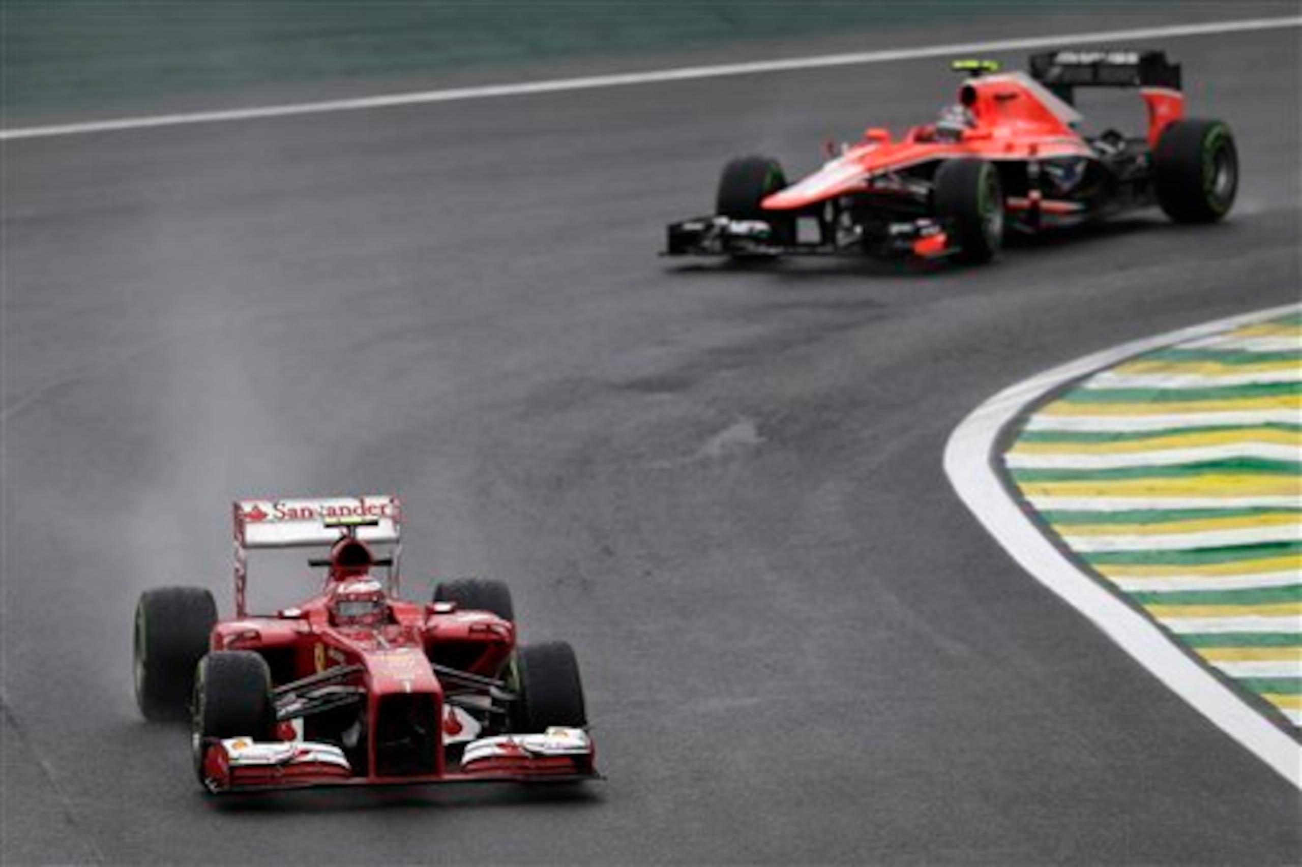 Bianchi chases the Ferrari of Felipe Massa at the 2013 Brazilian GP. That seat would have been his one day.
