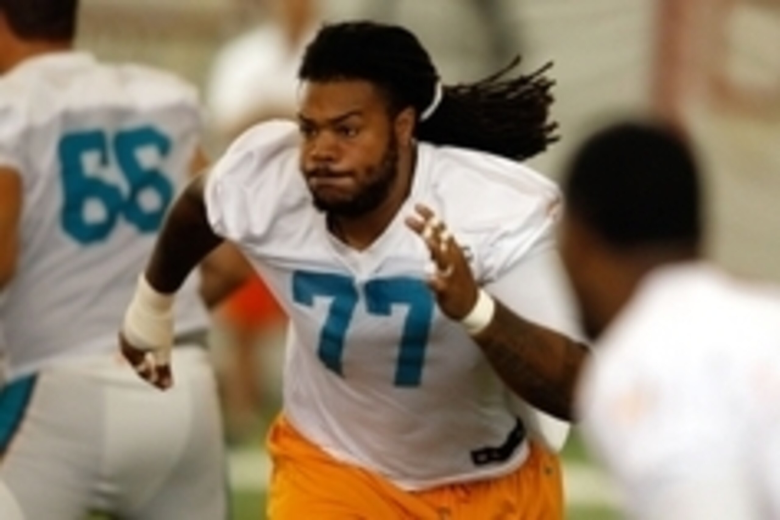 Dolphins OL Billy Turner (77, above) enters his second year in the NFL, and will need to show progress at his new position.