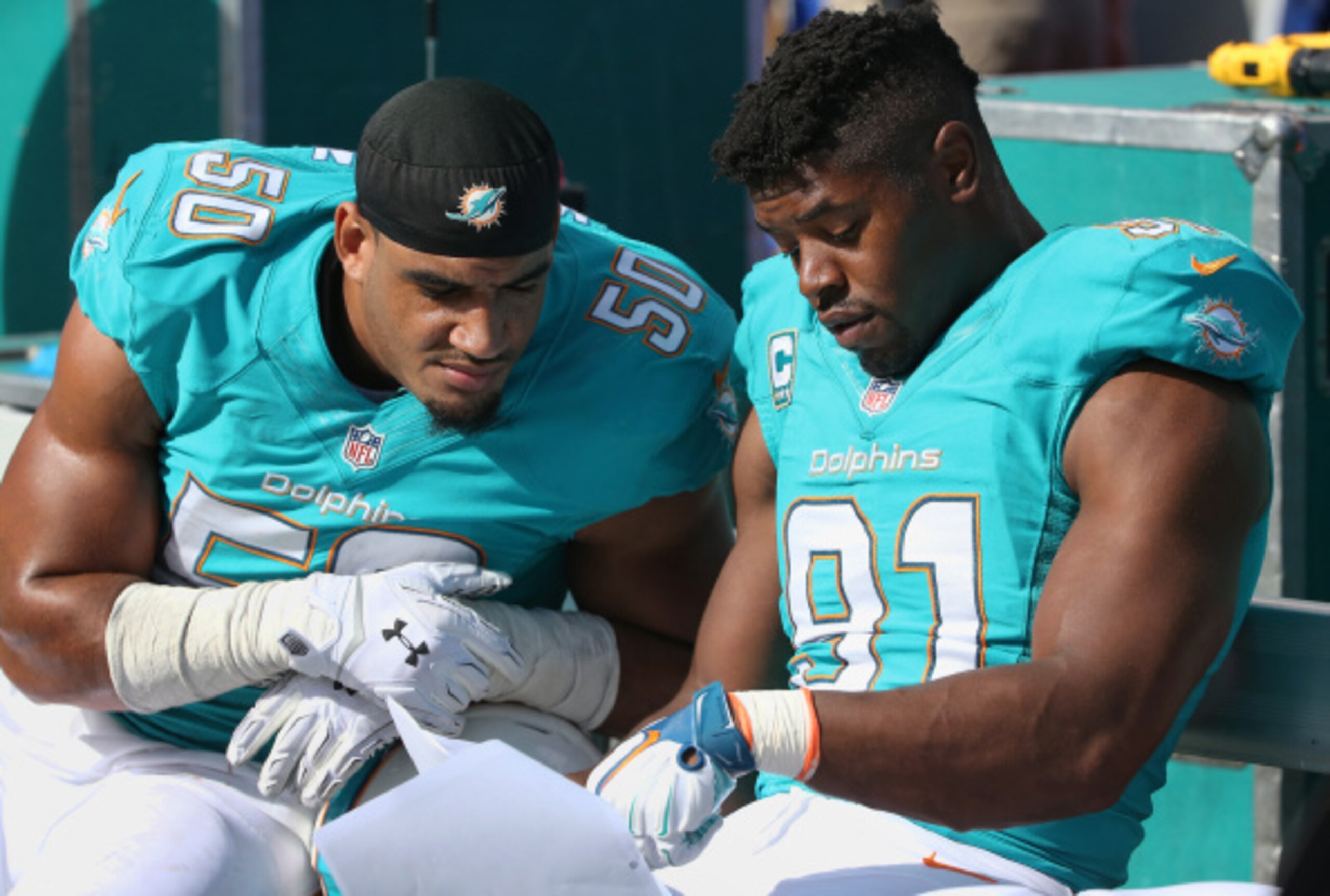 Olivier Vernon (50, left) and Cameron Wake (91, right) are a dominant pair of defensive ends.