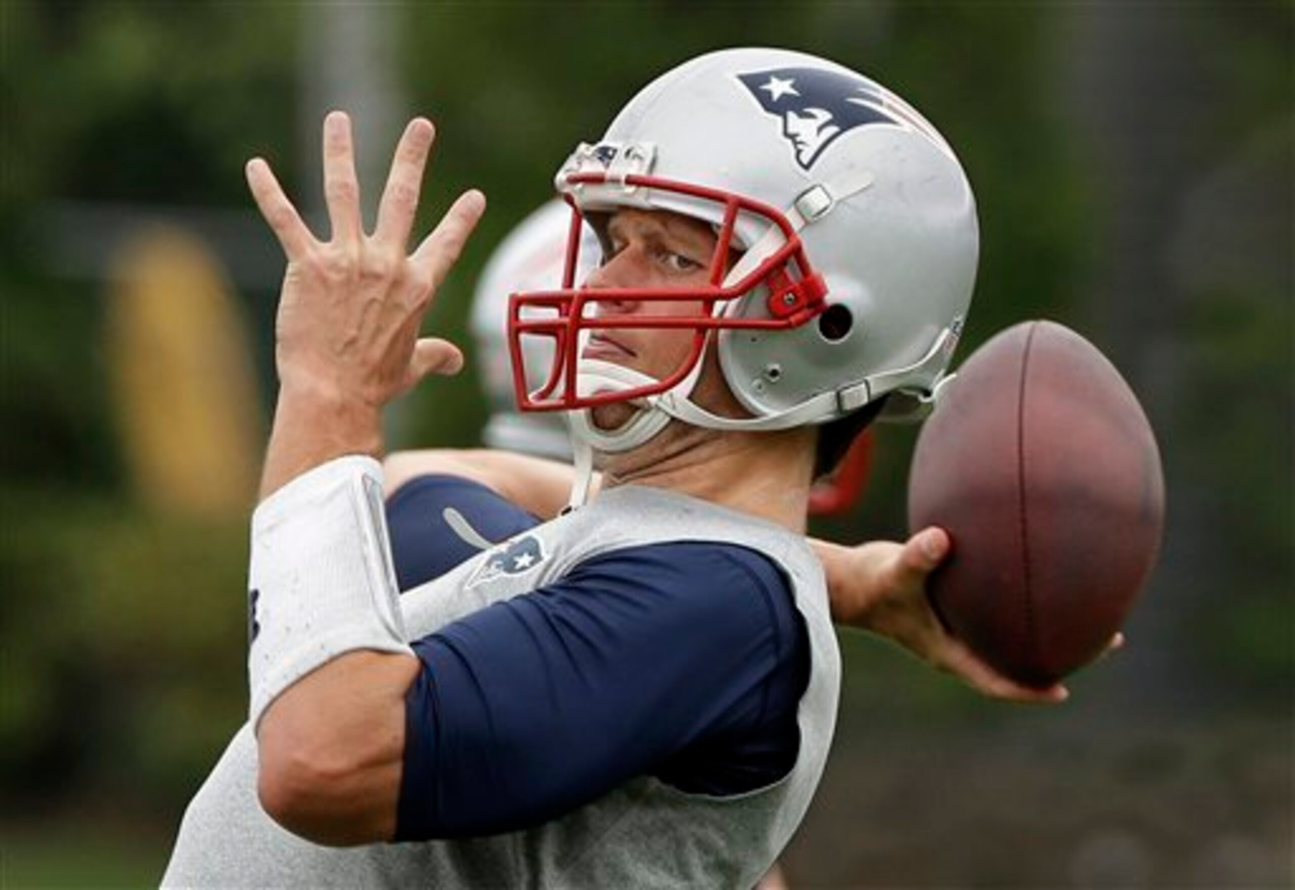 Quarterback Tom Brady (above) may or may not be available to the Patriots for the first four games of the regular season.