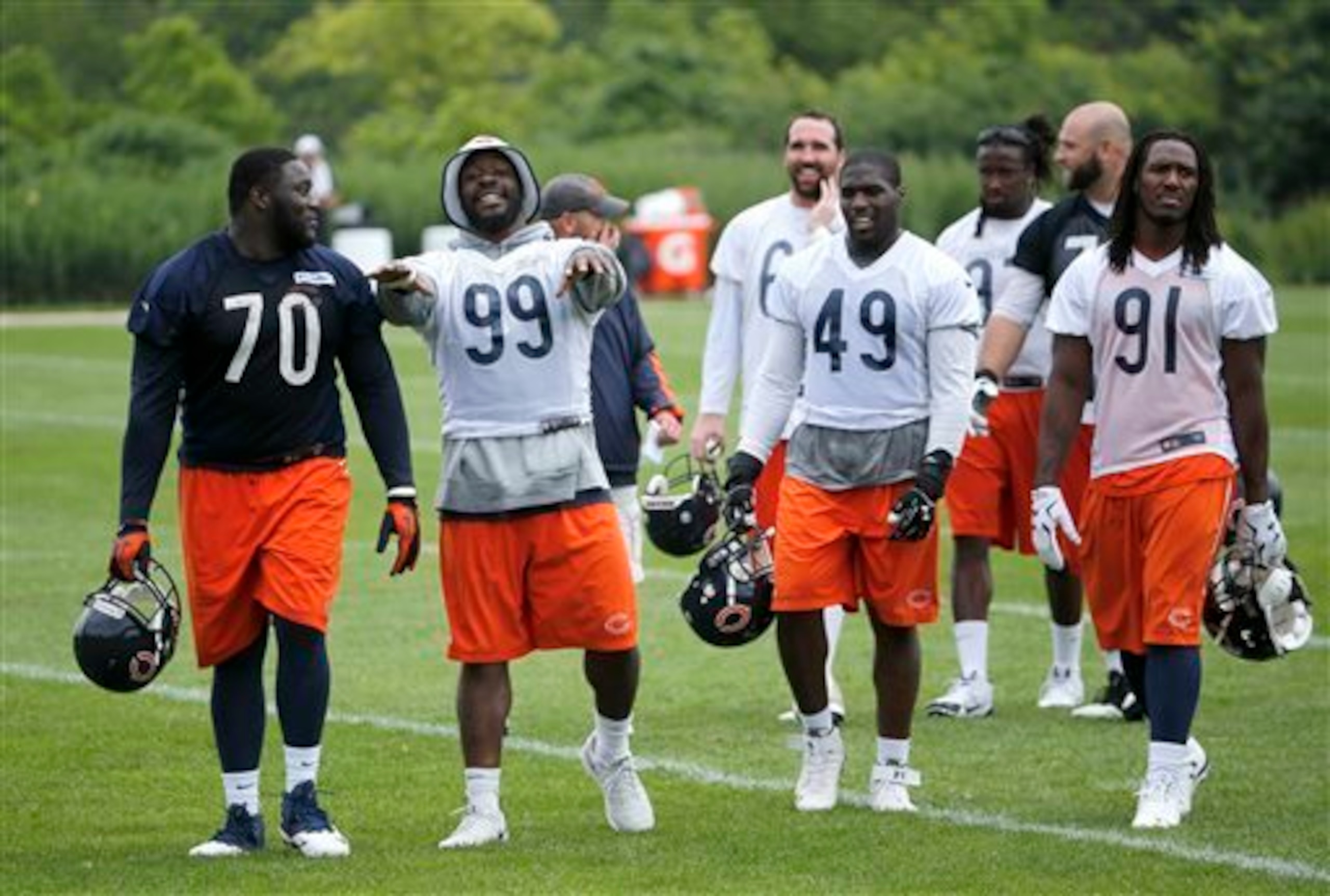 Lamarr Houston (99), Sam Acho (49) and David Bass (91) are among the outside linebackers competing for playing time with the Chicago Bears this summer. Lamarr Houston (99), Sam Acho (49) and David Bass (91) are among the outside linebackers competing for playing time with the Chicago Bears this summer.