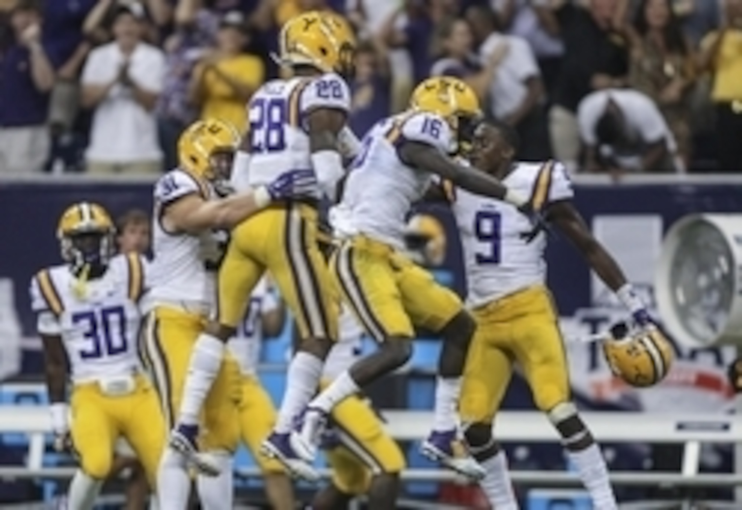 Jalen Mills and Tre'Davious White (center)
