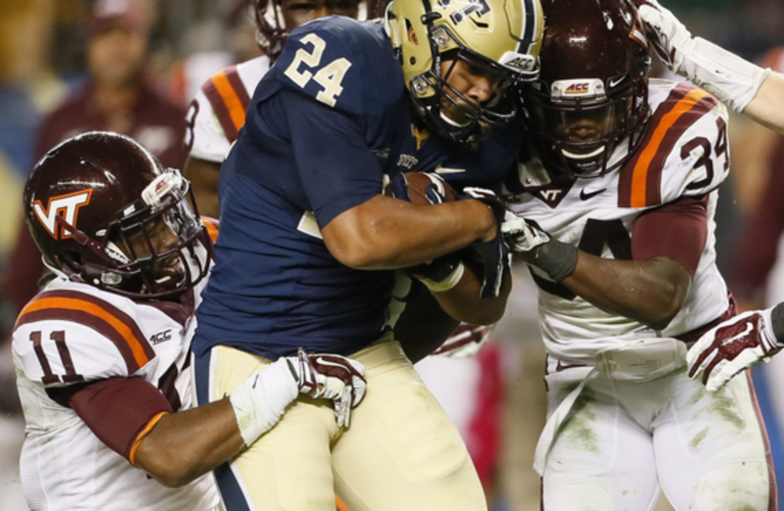 Several Hokies trying to bring James Conner down in last season's Pitt win Several Hokies trying to bring James Conner down in last season's Pitt win