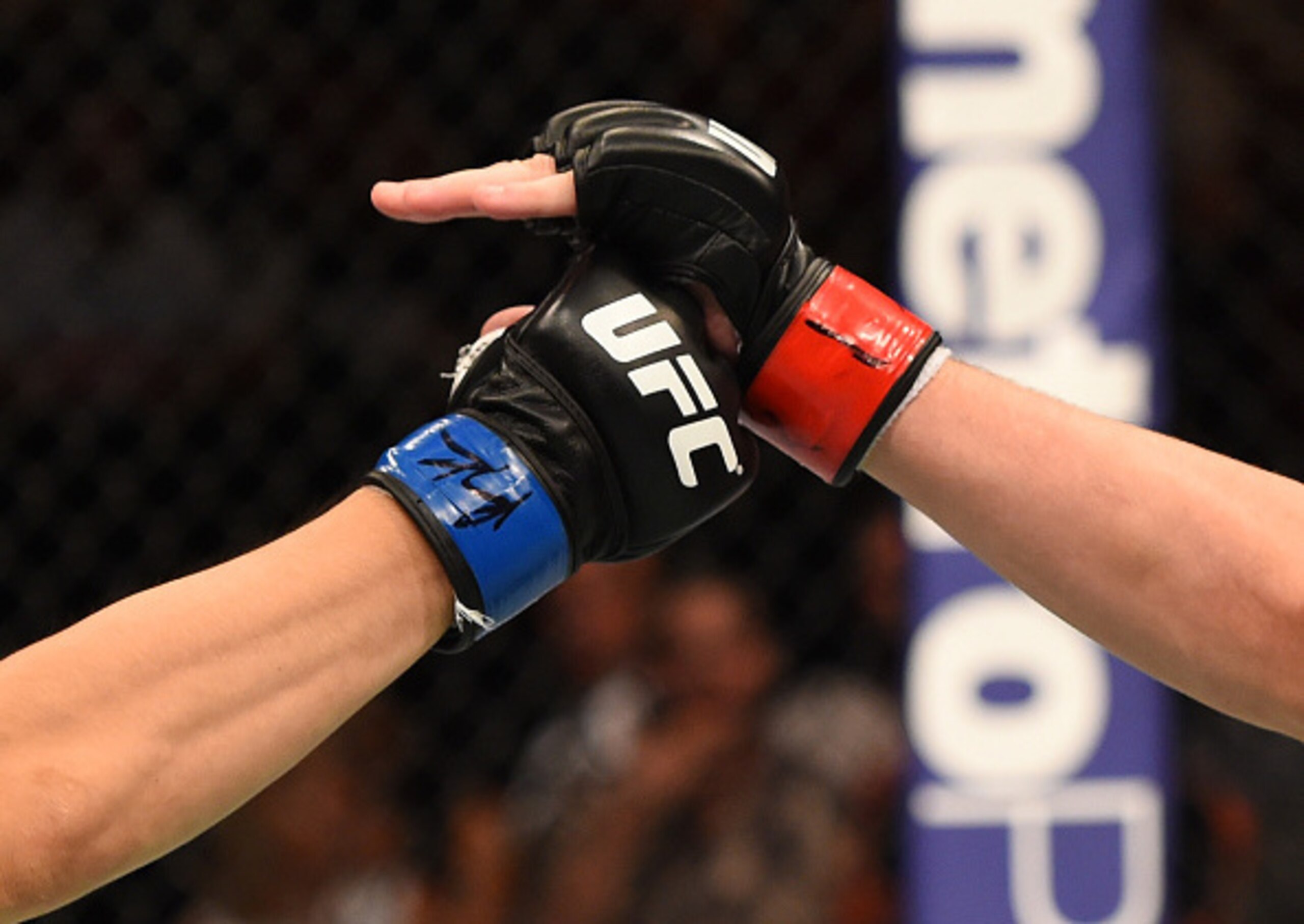 Joe Lauzon (right) and Takanori Gomi touch gloves before their fight. Joe Lauzon (right) and Takanori Gomi touch gloves before their fight.