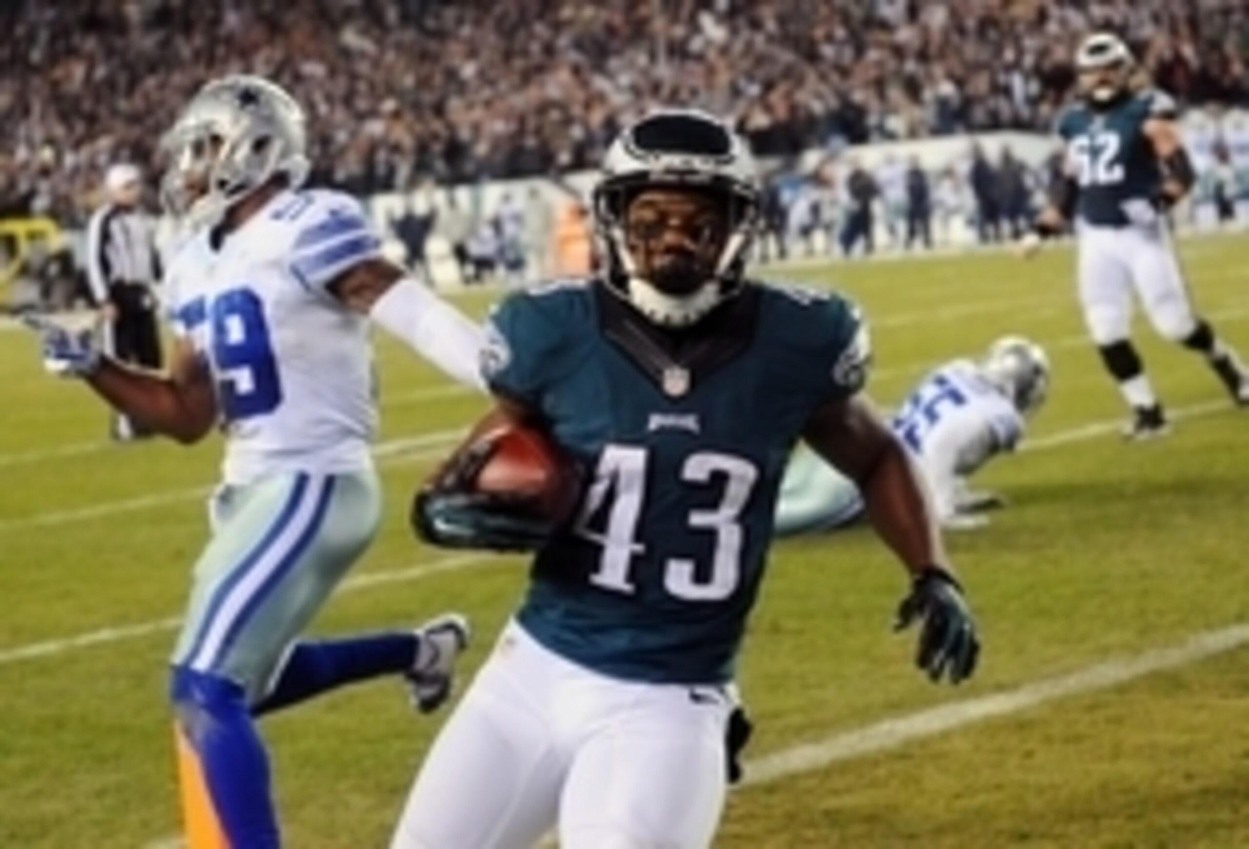 Dec 14, 2014; Philadelphia, PA, USA; Philadelphia Eagles running back Darren Sproles (43) scores a touchdown in the third quarter against the Dallas Cowboys at Lincoln Financial Field. Mandatory Credit: James Lang-USA TODAY Sports