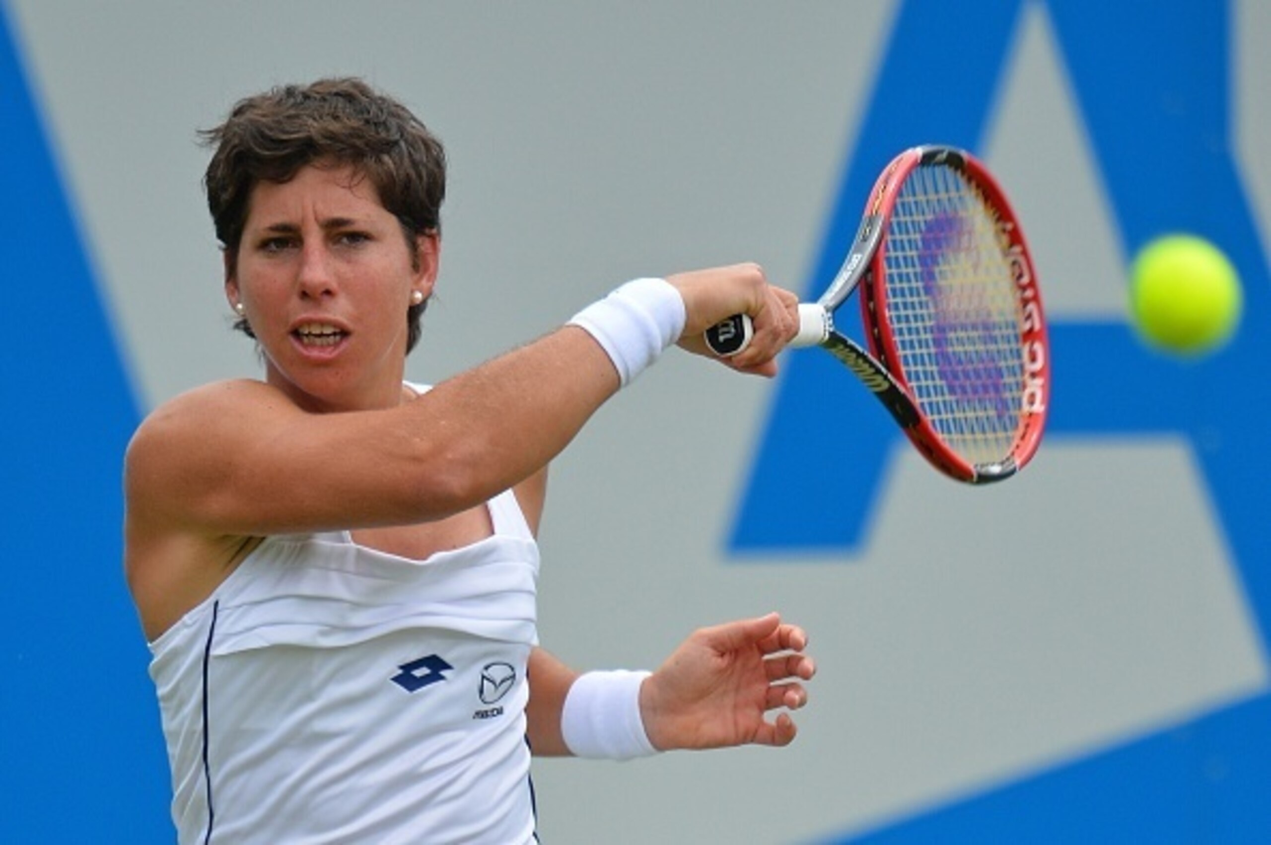Carla Suarez Navarro hits a forehand during the 2015 Aegon International tournament in Eastbourne, England.