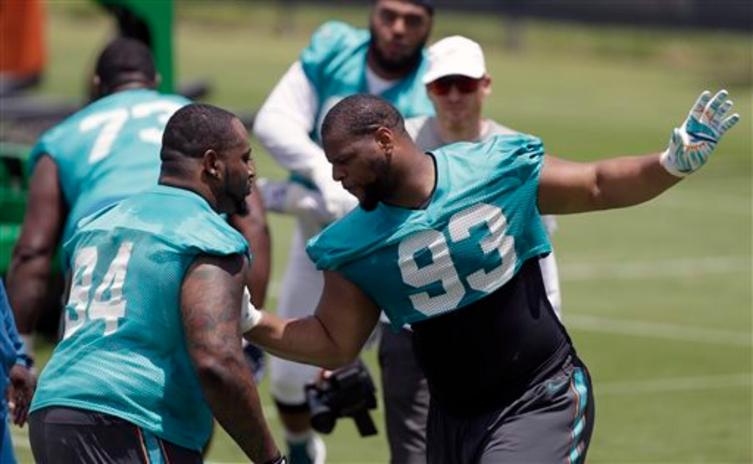 Dolphins defensive tackle Ndamukong Suh (93, right) may be the biggest impact free-agent signing in the entire NFL. Dolphins defensive tackle Ndamukong Suh (93, right) may be the biggest impact free-agent signing in the entire NFL.