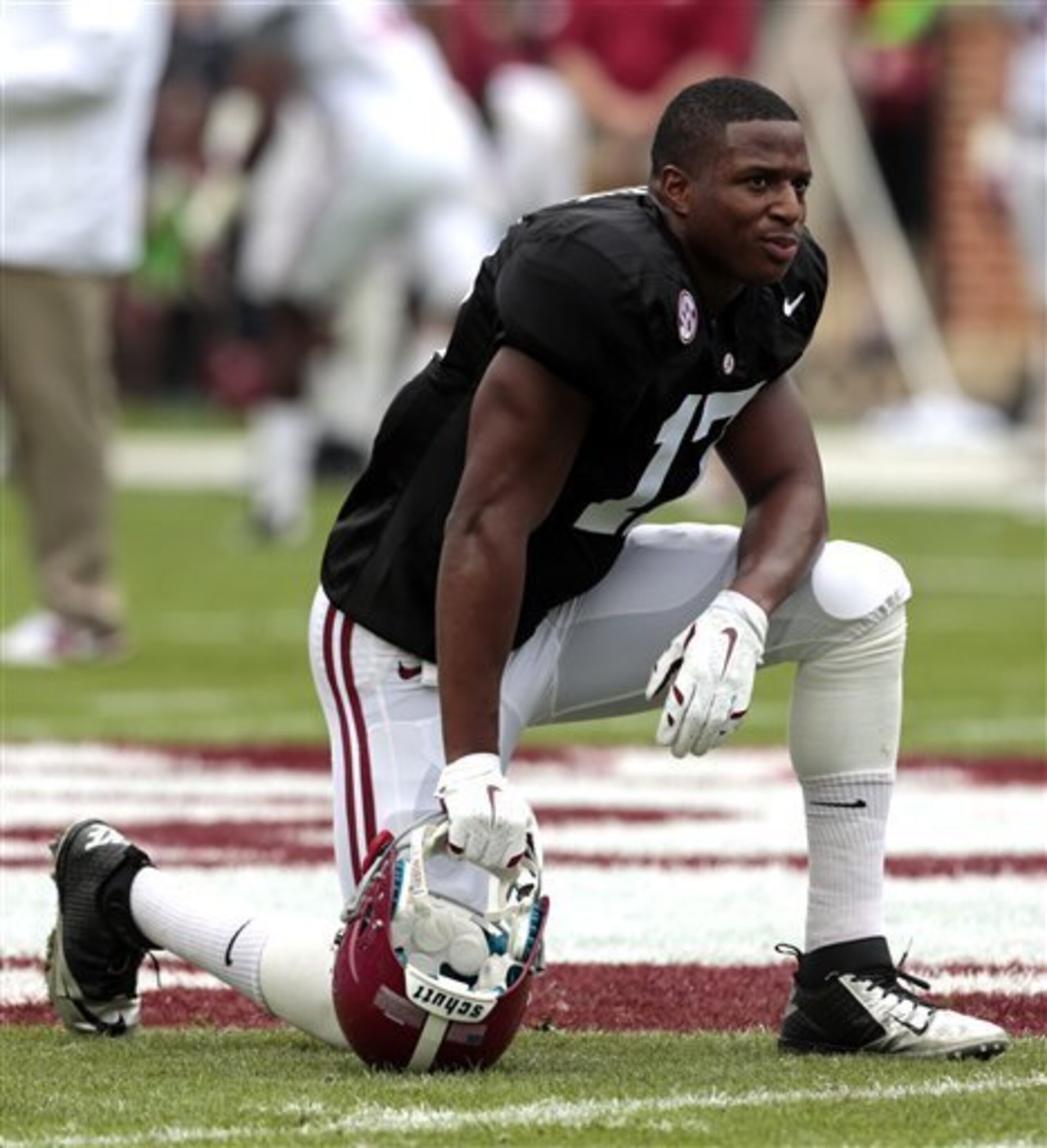 Running back Kenyan Drake is eager to lose the black no-contact jersey he had to wear all spring.