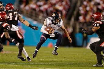 Navy QB Keenan Reynolds is dangerous in an option offense.