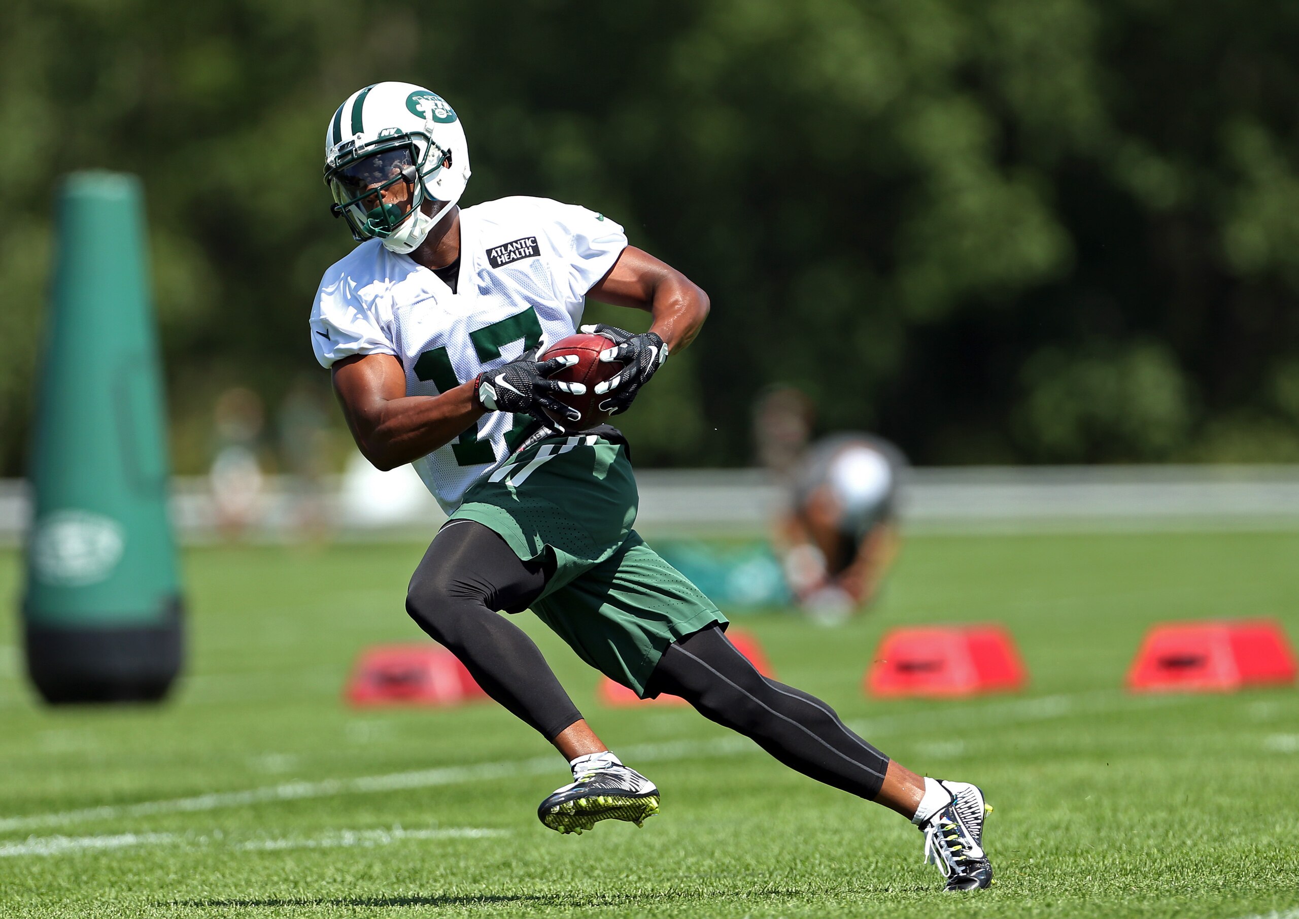 Wide receiver Chris Owusu (17, above) is fighting for a job in the Jets offense.