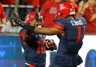 Arizona WRs Samajie Grant and Cayleb Jones