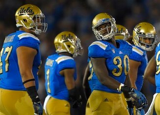 UCLA DE Eddie Vanderdoes and LB Myles Jack