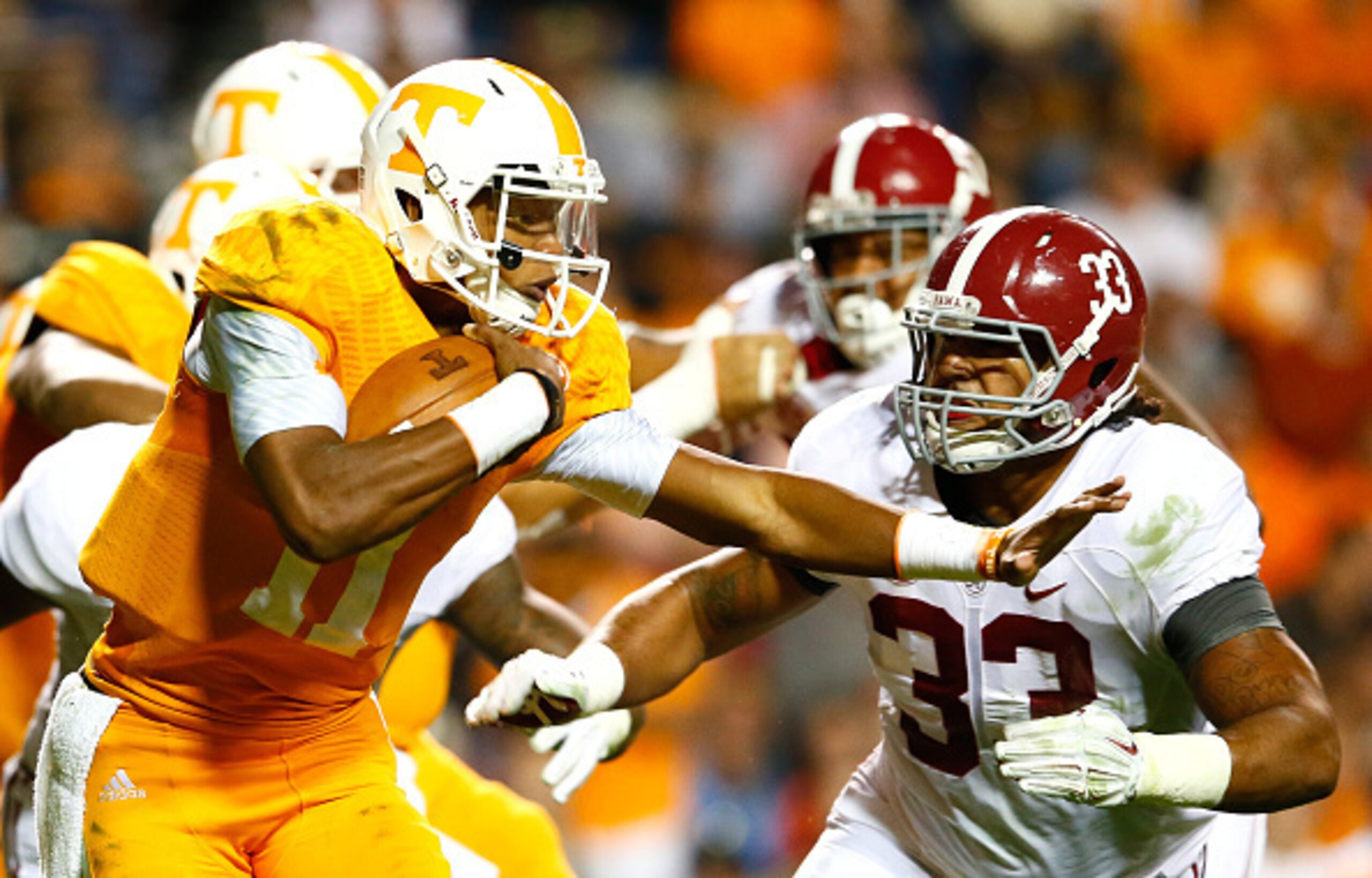Tennessee QB Joshua Dobbs (left)