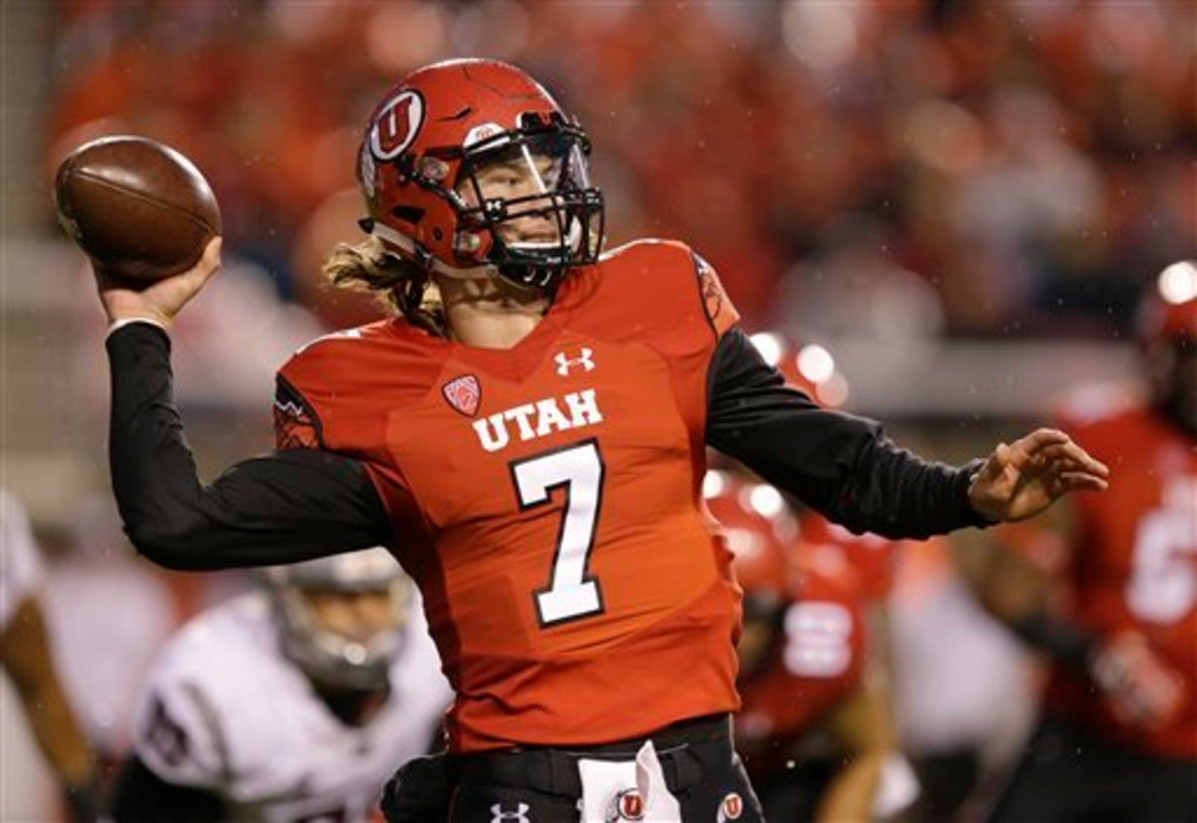 Senior Travis Wilson threw 18 touchdown passes with just 5 interceptions for the Utes in 2014.