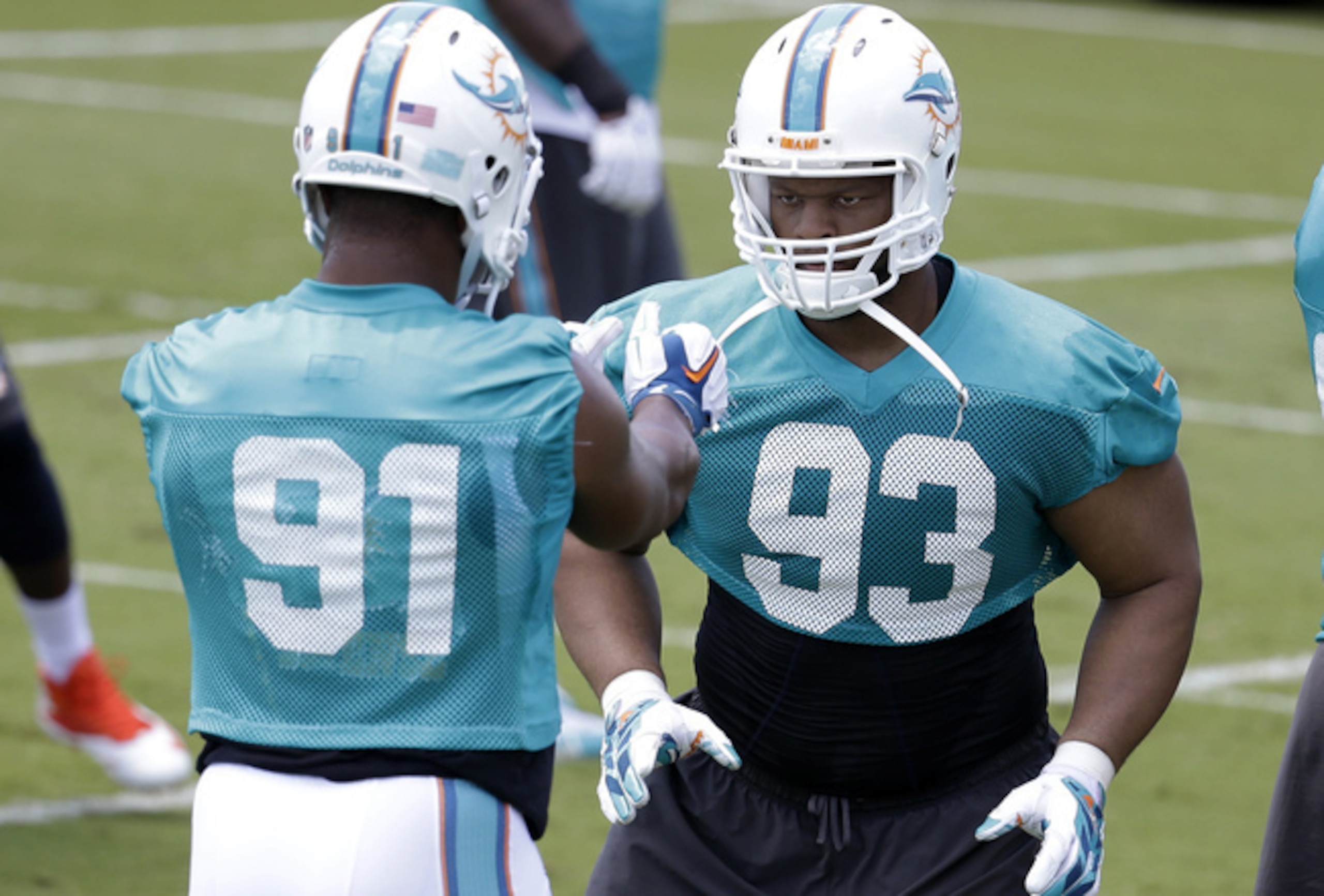 Pro Bowl defensive linemen Cameron Wake (91, left) and Ndamukong Suh (93, right) will be two of the most important players on the entire Dolphins defense in 2015. Pro Bowl defensive linemen Cameron Wake (91, left) and Ndamukong Suh (93, right) will be two of the most important players on the entire Dolphins defense in 2015.