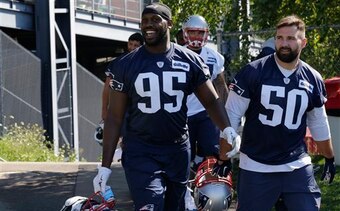 Defensive ends Chandler Jones (95, left) and Rob Ninkovich (50, right) are the incumbent starters.