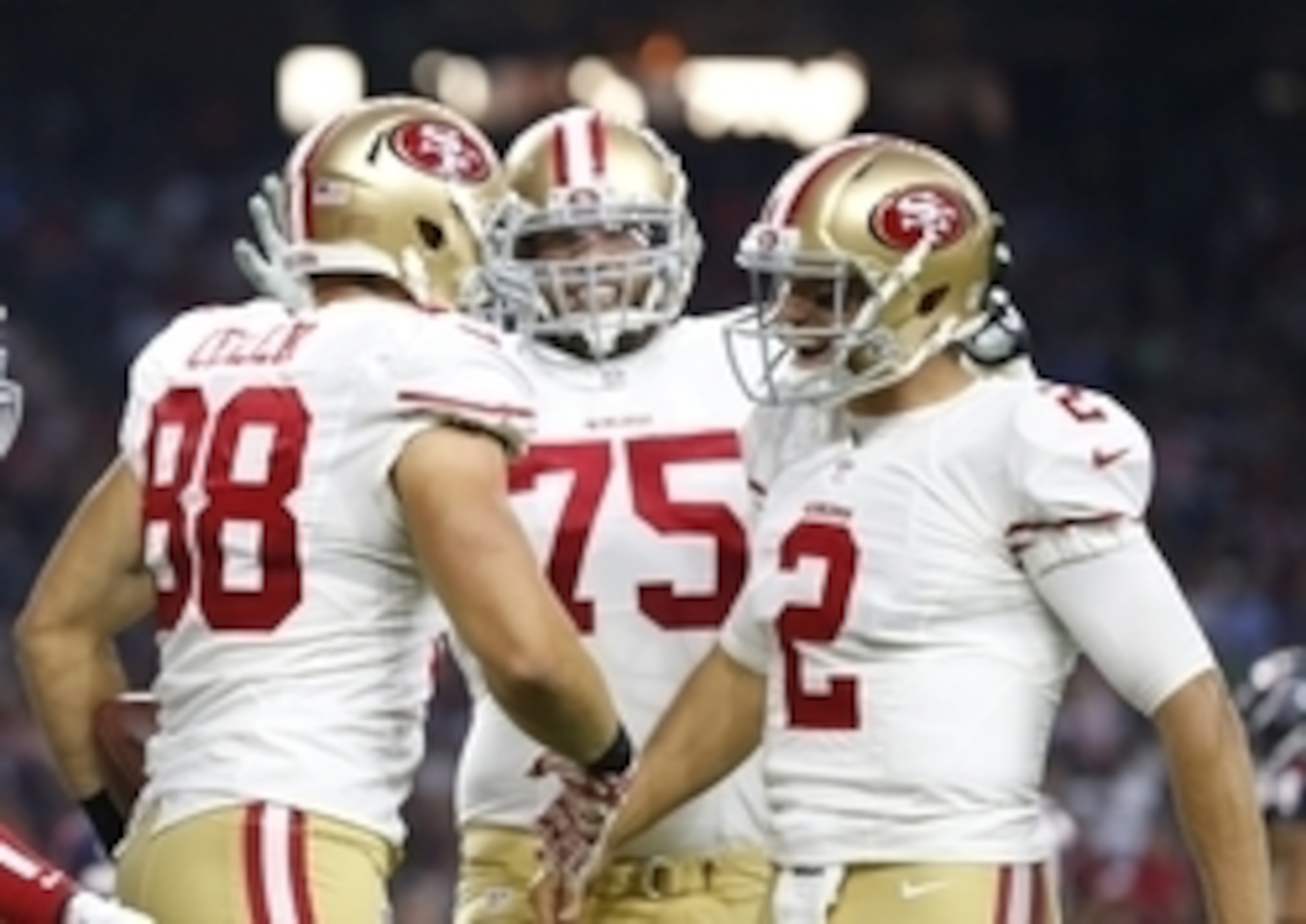 Aug 15, 2015; Houston, TX, USA; San Francisco 49ers tight end Garrett Celek (88) celebrates his second quarter touchdown with quarterback Blaine Gabbert (2) and guard Alex Boone (75) against the Houston Texans in a preseason NFL football game at NRG Stadi