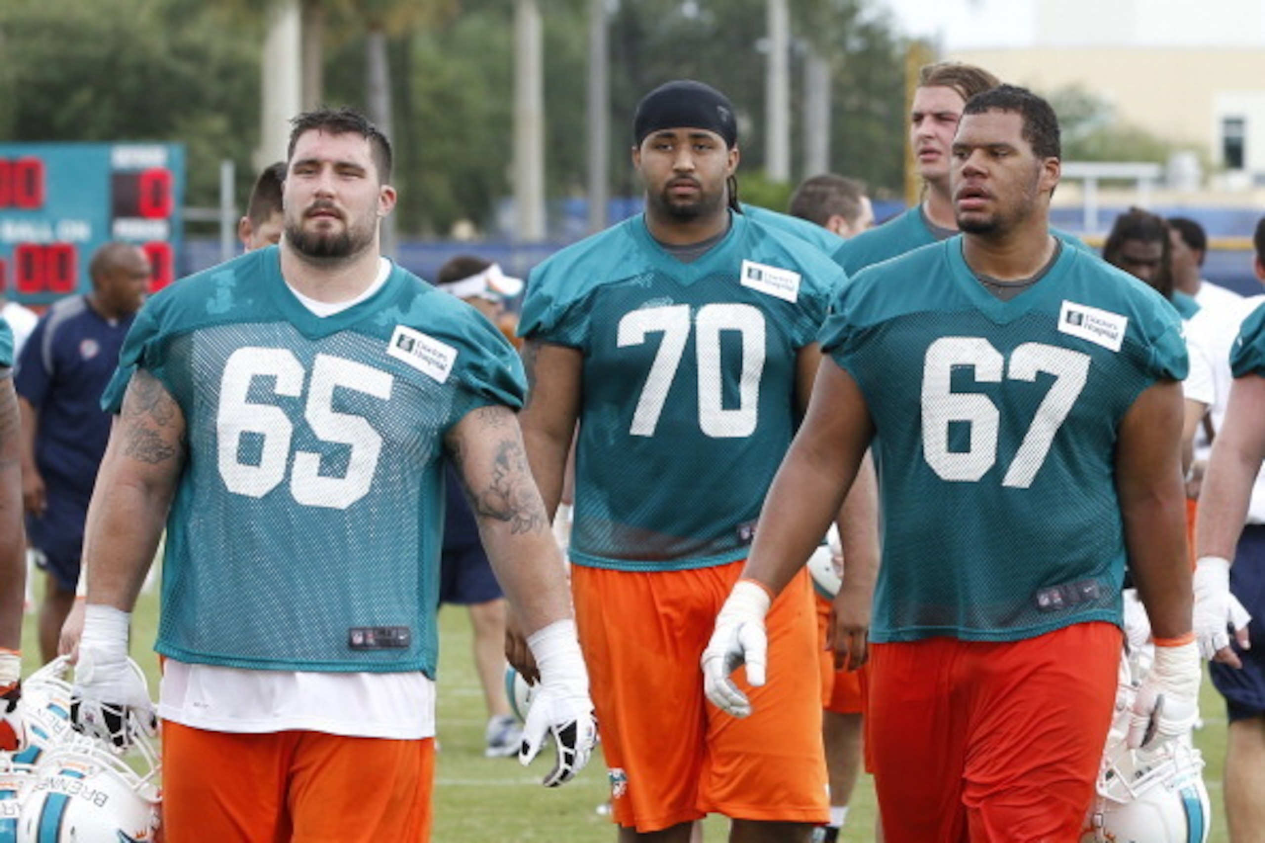 The Miami Dolphins have a lot of depth on the offensive line, which could mean Sam Brenner (65, left) is on the outside looking in.