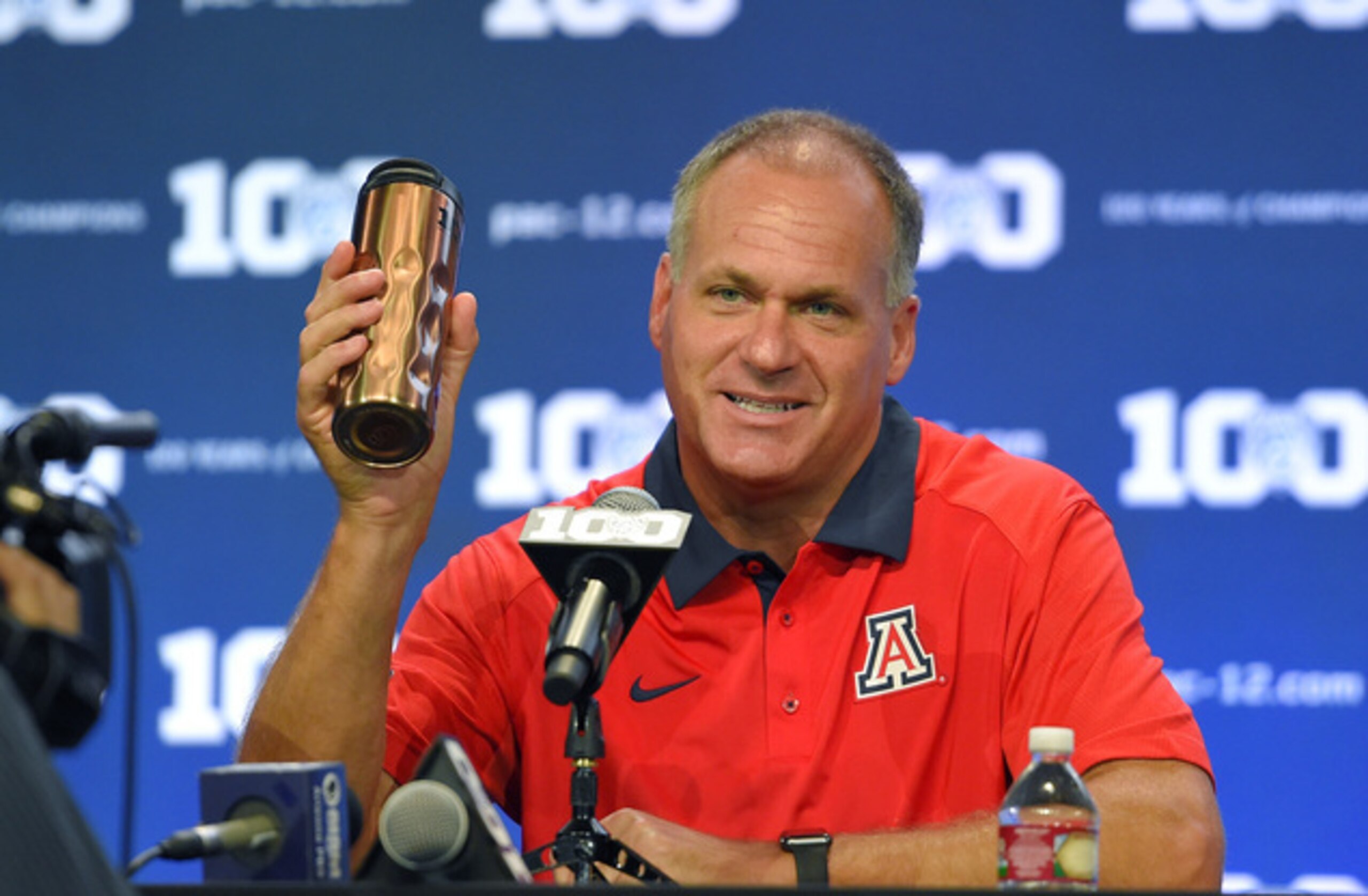 Rich Rod enjoying a beverage.