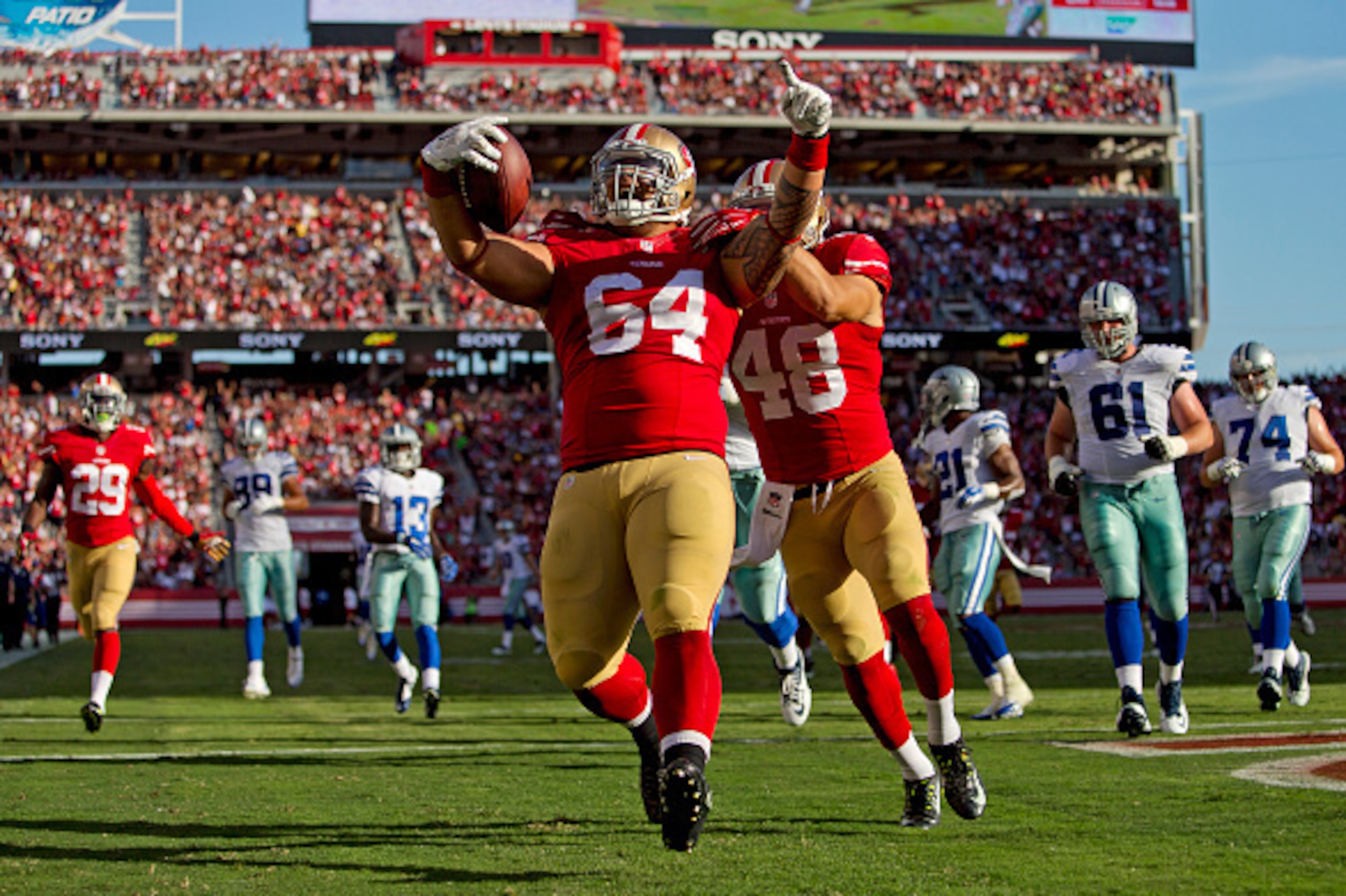 Nose tackle Mike Purcell scored an unexpected touchdown after picking off a Dallas pass attempt.