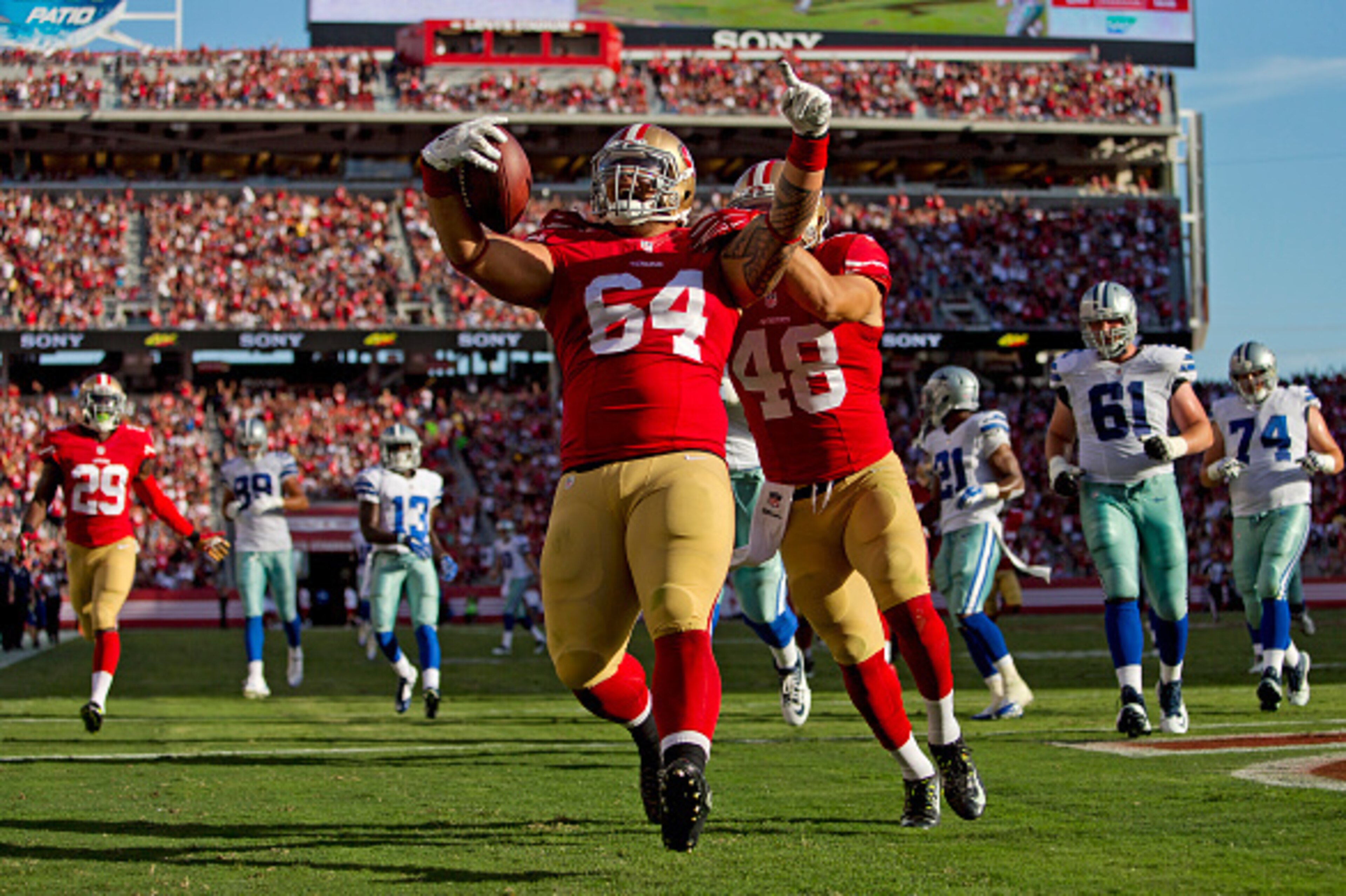 Nose tackle Mike Purcell scored an unexpected touchdown after picking off a Dallas pass attempt. Nose tackle Mike Purcell scored an unexpected touchdown after picking off a Dallas pass attempt.