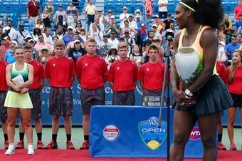 Simona Halep looks on as Serena Williams addresses the Cincinnati crowd after winning the Western & Southern Open.