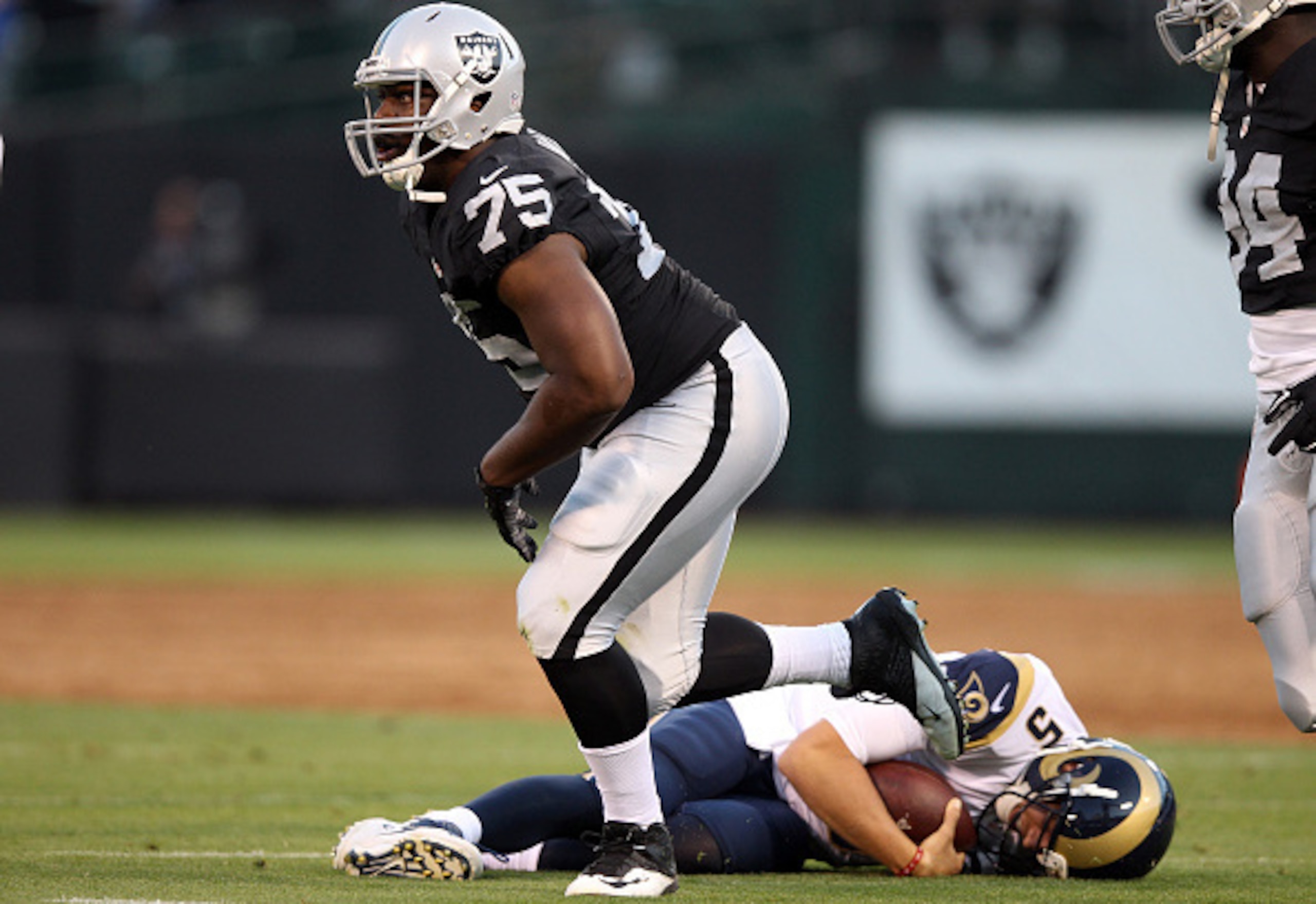 No. 75 Shelby Harris after he sacks quarterback Nick Foles