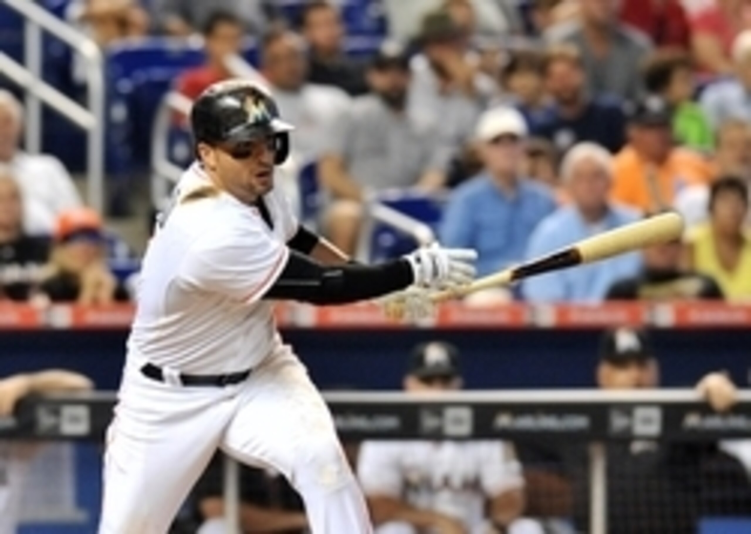 Aug 12, 2015; Miami, FL, USA; Miami Marlins third baseman Martin Prado (14) hits an RBI single during the sixth inning against the Boston Red Sox at Marlins Park. Mandatory Credit: Steve Mitchell-USA TODAY Sports