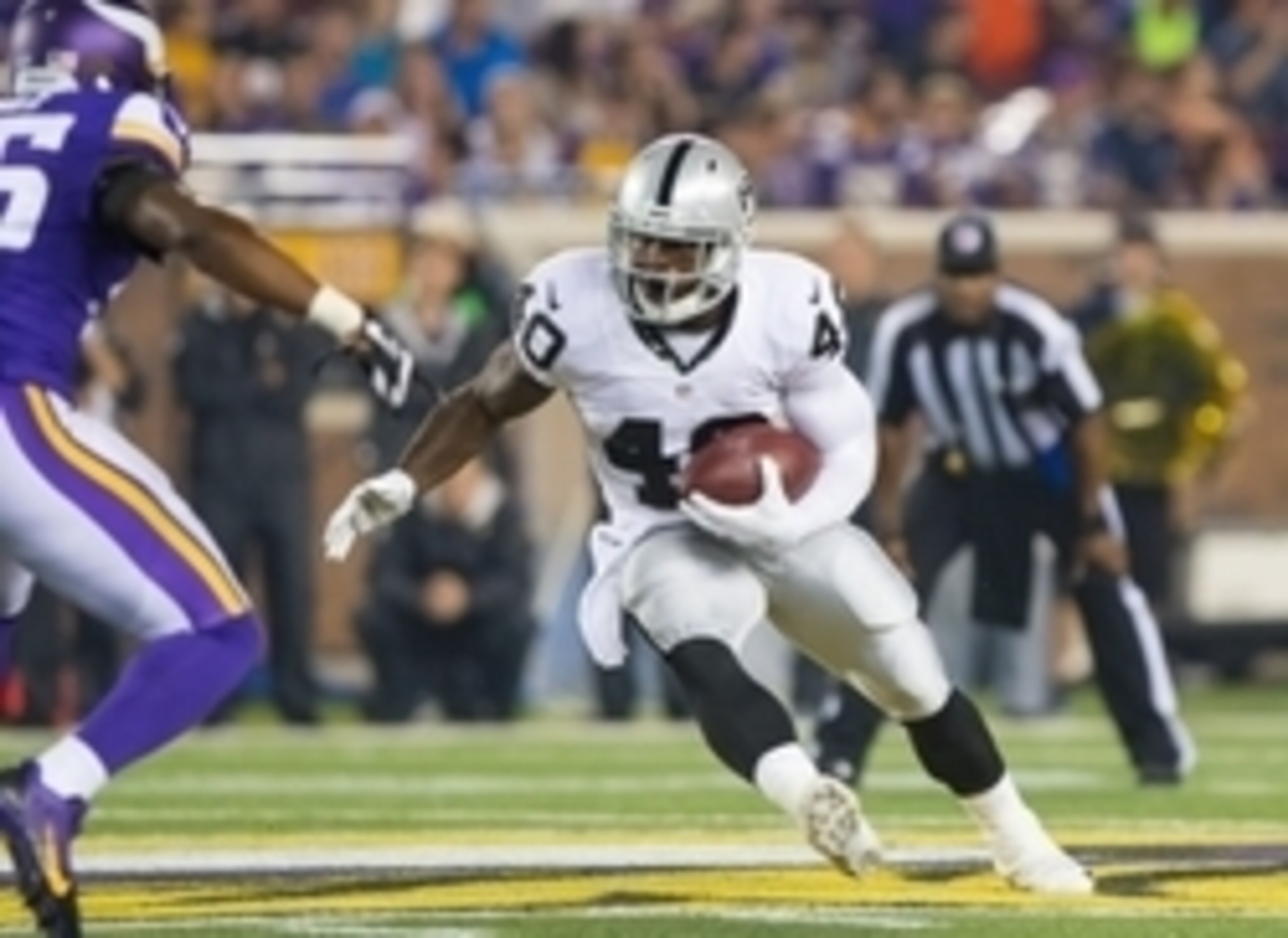 Michael Dyer taking a carry against the Minnesota Vikings.