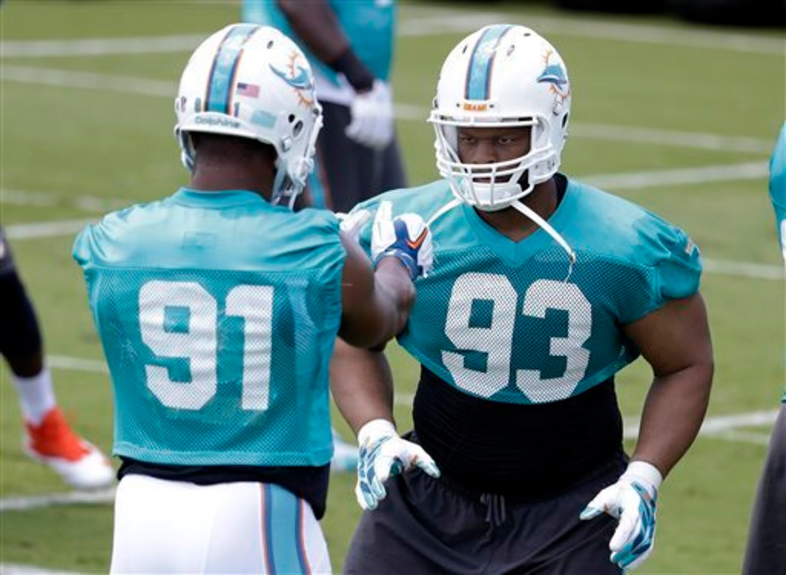 Cameron Wake (91, left) and Ndamukong Suh (93, right) are two of the best defensive linemen in the entire NFL.