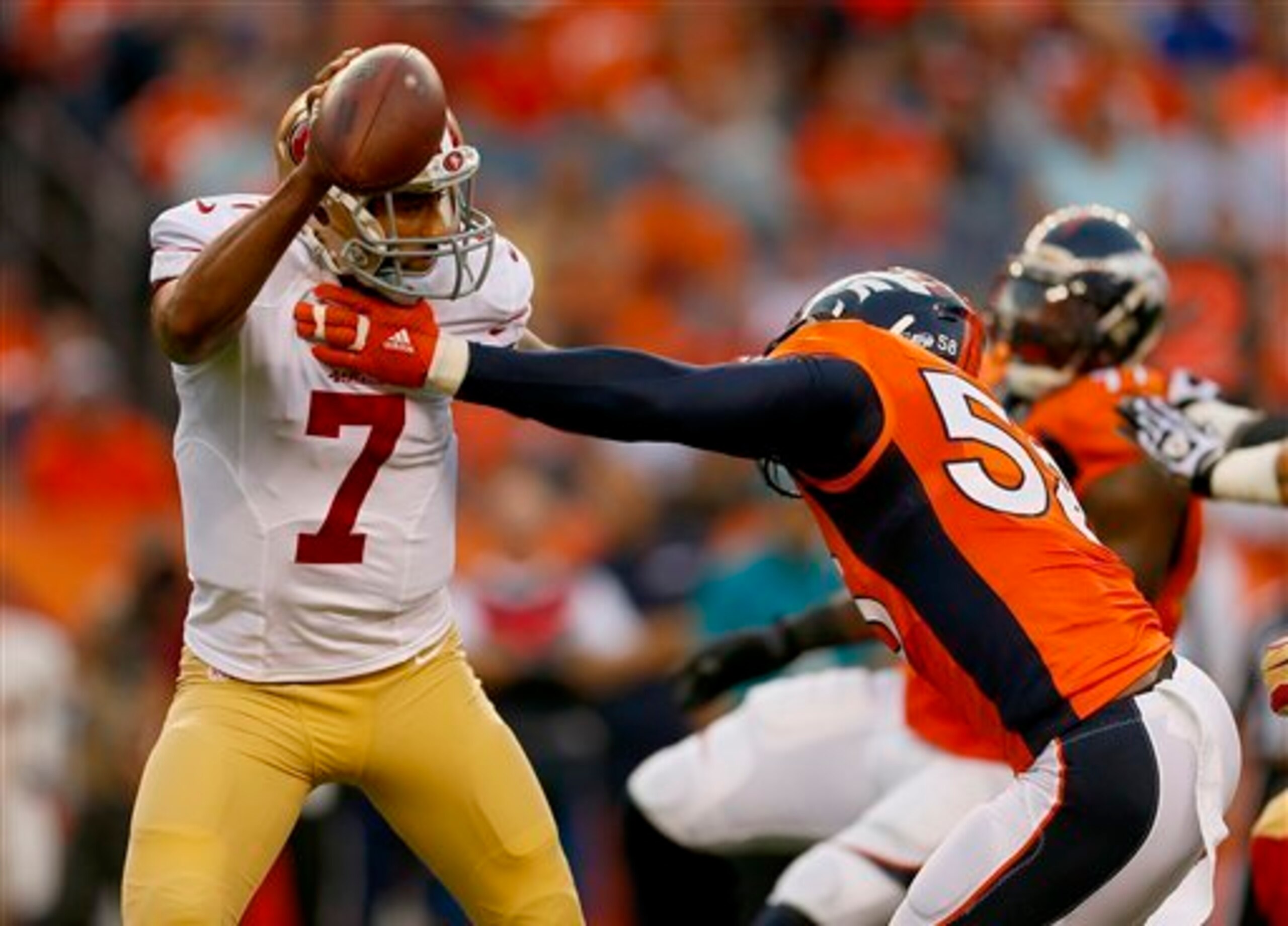 Quarterback Colin Kaepernick was frequently under pressure from a relentless Broncos pass rush.