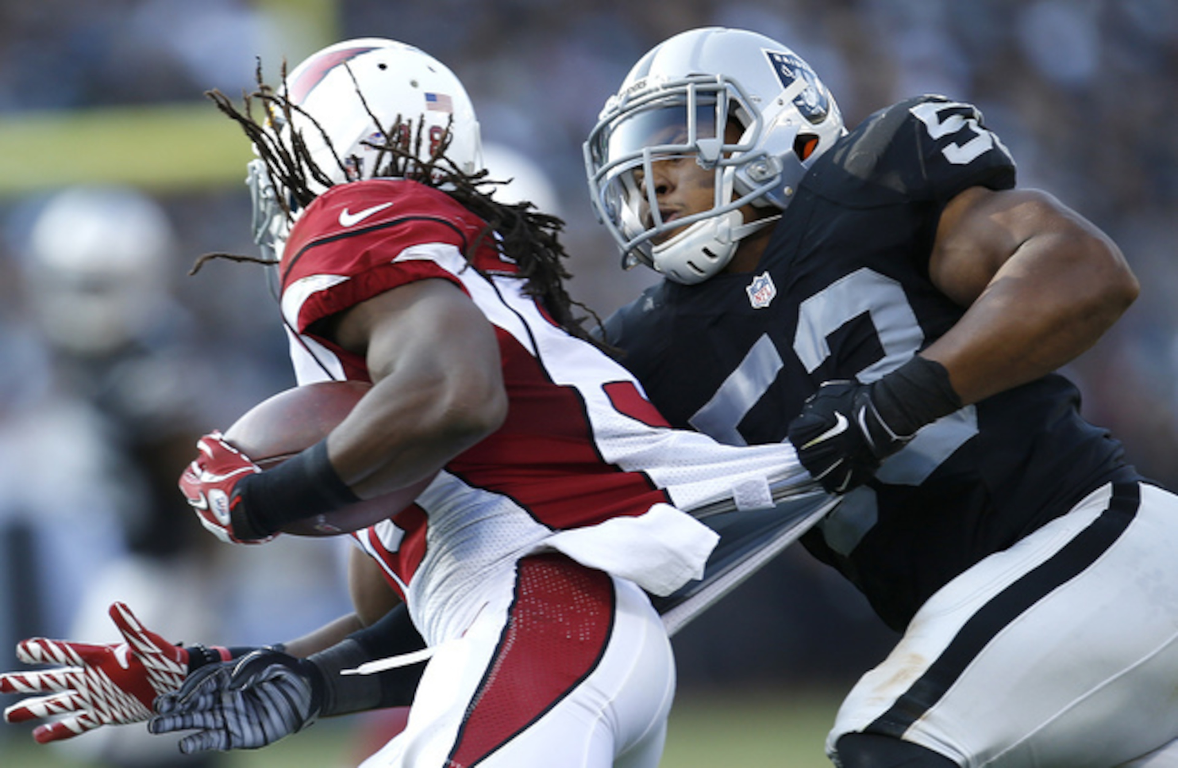 No. 53 Malcolm Smith takes down a ball-carrier.