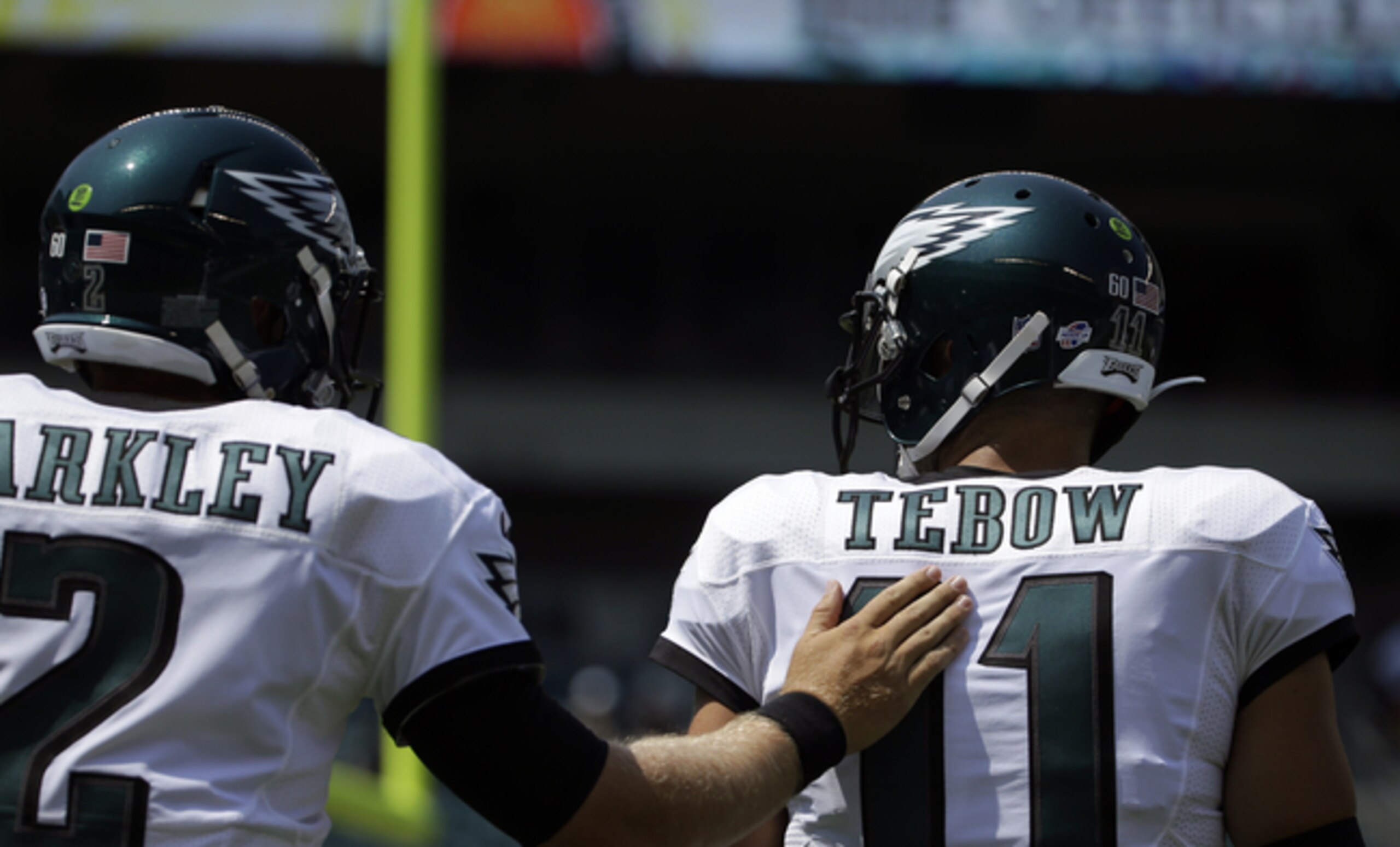 Tim Tebow and Matt Barkley are battling it out for the Eagles' third quarterback job.
