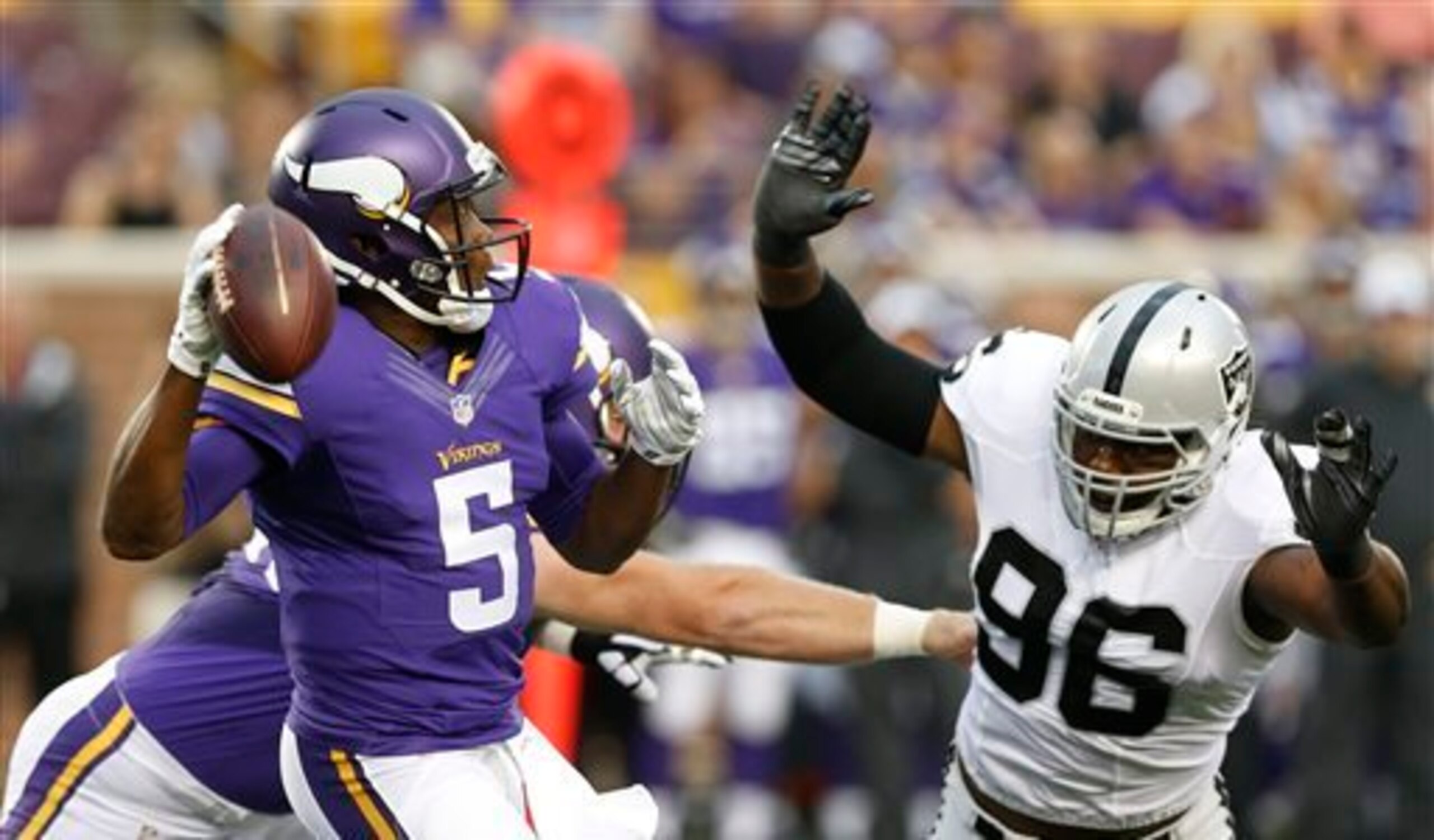No. 96 Denico Autry pressuring Minnesota Vikings QB Teddy Bridgewater