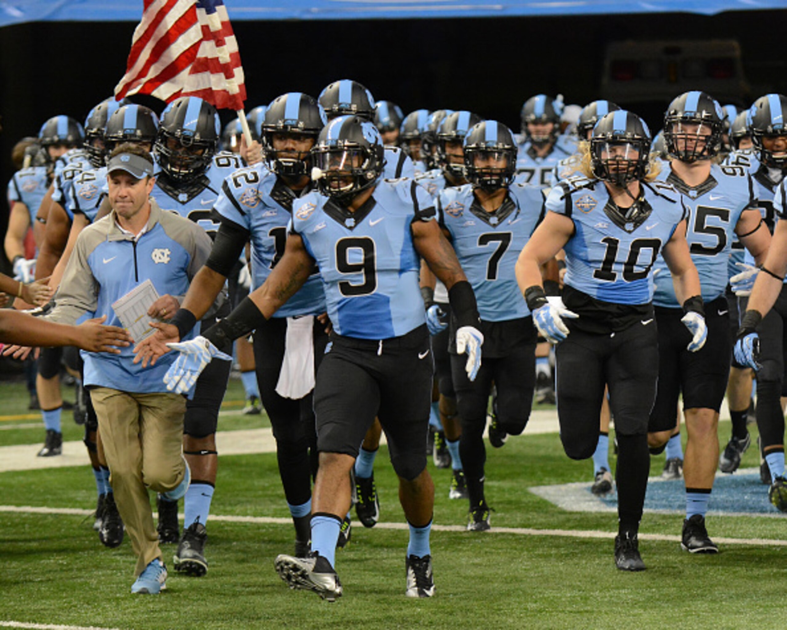 Fedora leading his troops onto the field.