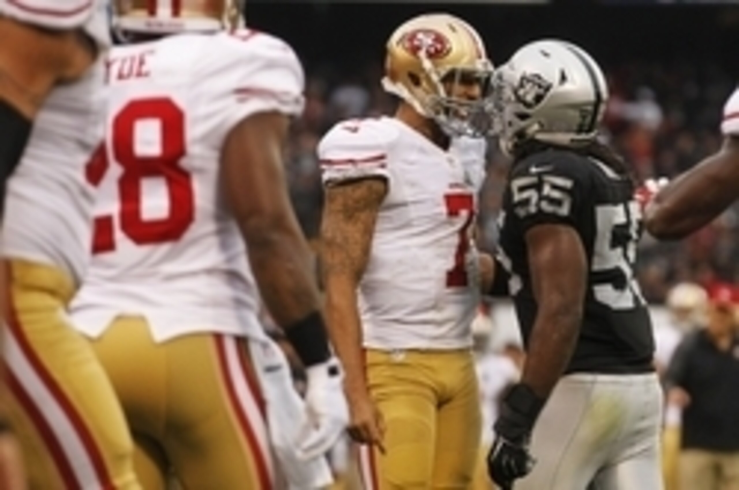 Dec 7, 2014; Oakland, CA, USA; San Francisco 49ers quarterback Colin Kaepernick (7) and Oakland Raiders outside linebacker Sio Moore (55) talk after a play in the third quarter at O.co Coliseum. Mandatory Credit: Cary Edmondson-USA TODAY Sports Dec 7, 2014; Oakland, CA, USA; San Francisco 49ers quarterback Colin Kaepernick (7) and Oakland Raiders outside linebacker Sio Moore (55) talk after a play in the third quarter at O.co Coliseum. Mandatory Credit: Cary Edmondson-USA TODAY Sports