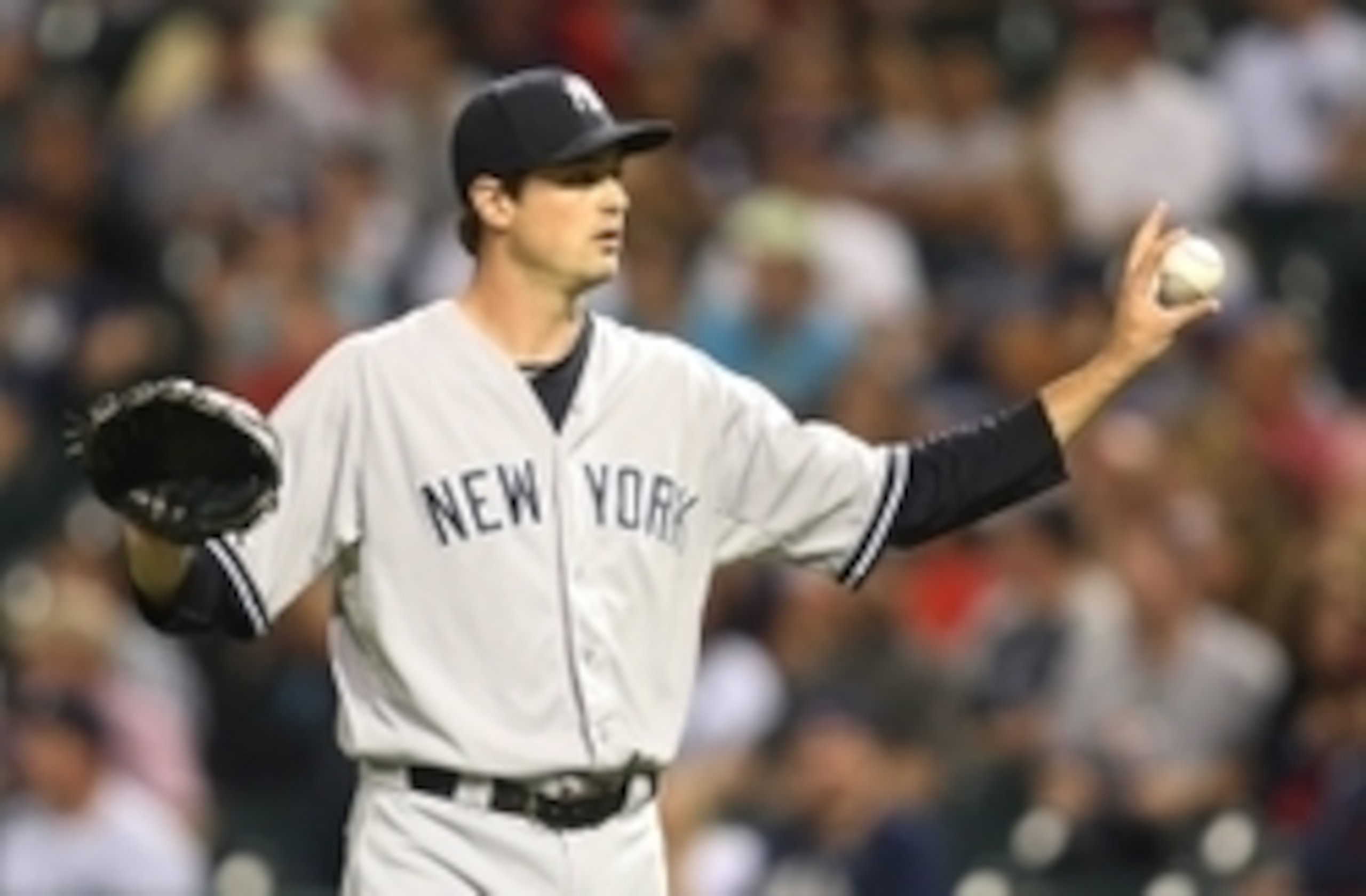Aug 13, 2015; Cleveland, OH, USA; New York Yankees relief pitcher Andrew Miller (48) asks for time-out against the Cleveland Indians during the ninth inning at Progressive Field. The Yankees won 8-6. Mandatory Credit: Charles LeClaire-USA TODAY Sports