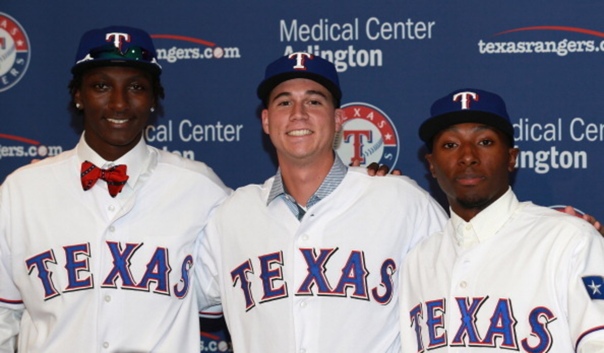 Travis Demeritte, right, with fellow 2013 draft picks Akeem Bostick and Chi Chi Gonzalez.