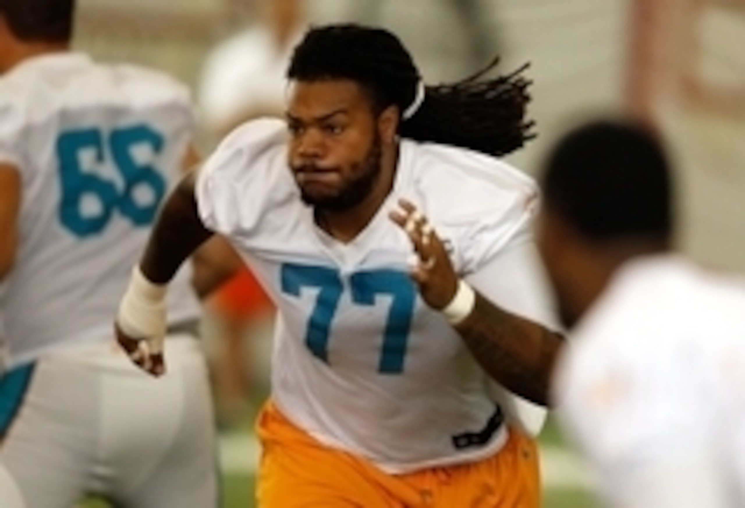 Billy Turner (77) missed an opportunity to claim the starting right guard job as his own this offseason.