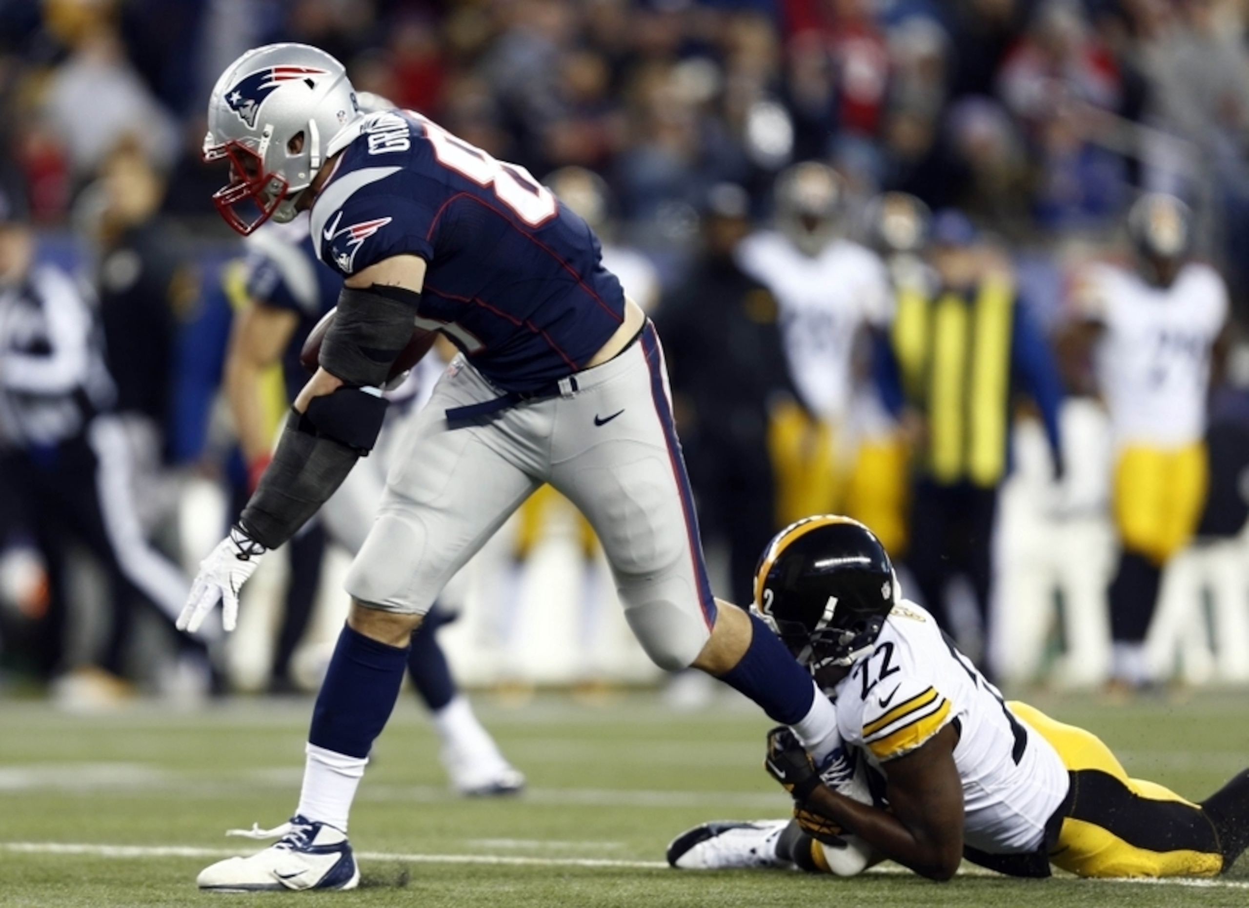 Steelers cornerback William Gay attempts to tackle Patriots tight end Rob Gronkowski. Steelers cornerback William Gay attempts to tackle Patriots tight end Rob Gronkowski.