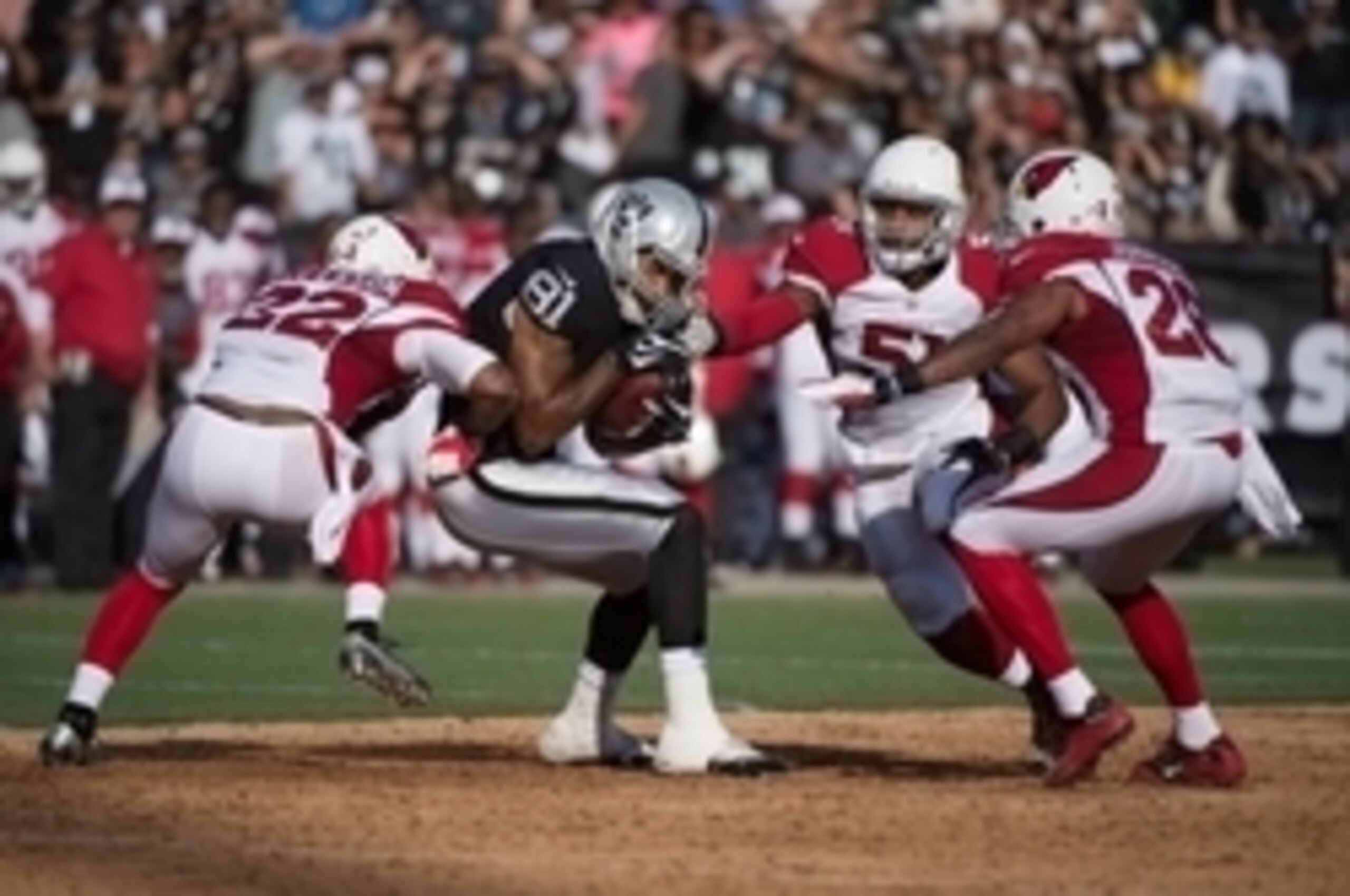 No. 81 Mychal Rivera makes a catch in traffic