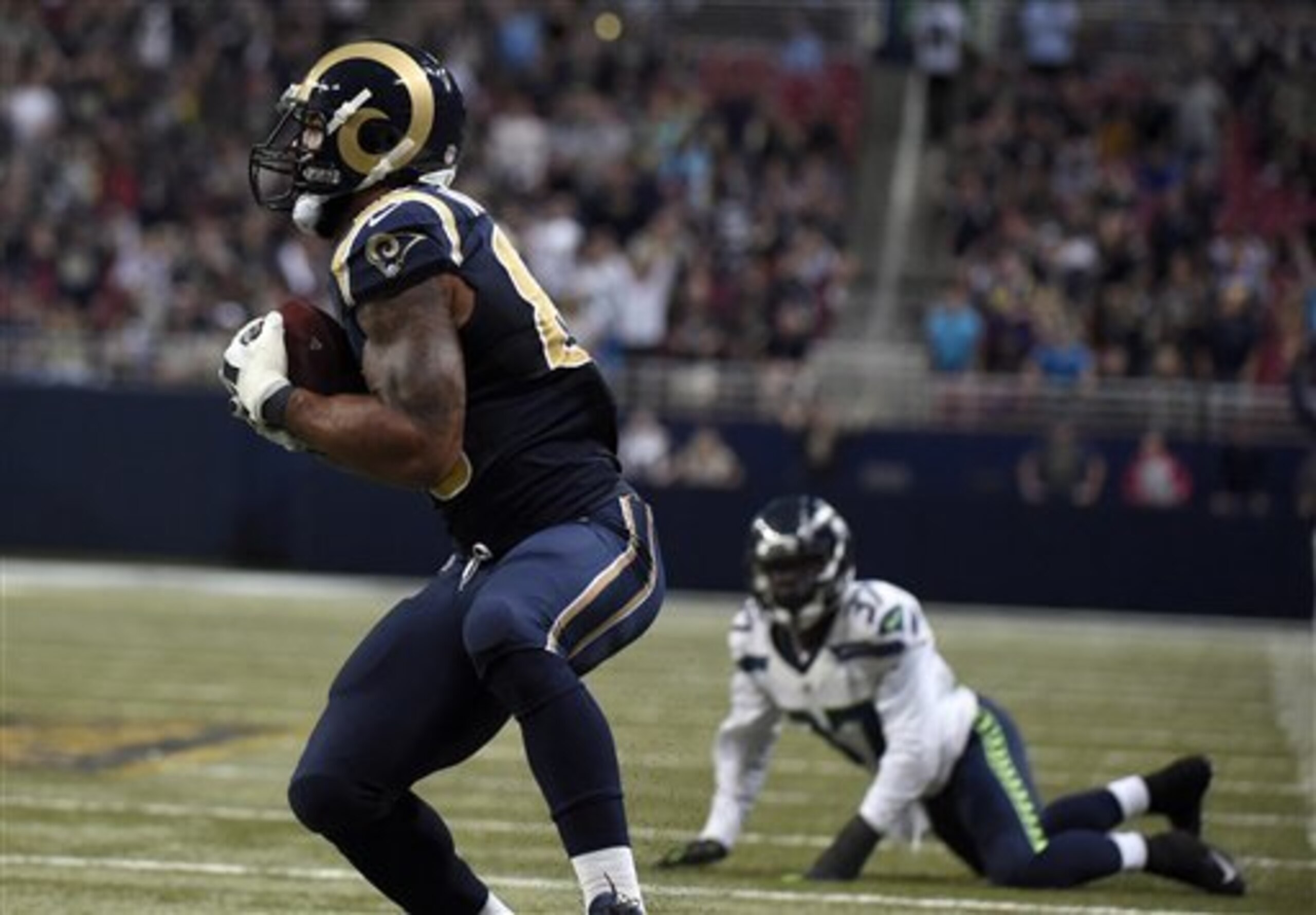Kam Chancellor replacement Dion Bailey looks on as Lance Kendricks hauls in the pass that would become the game-tying score.