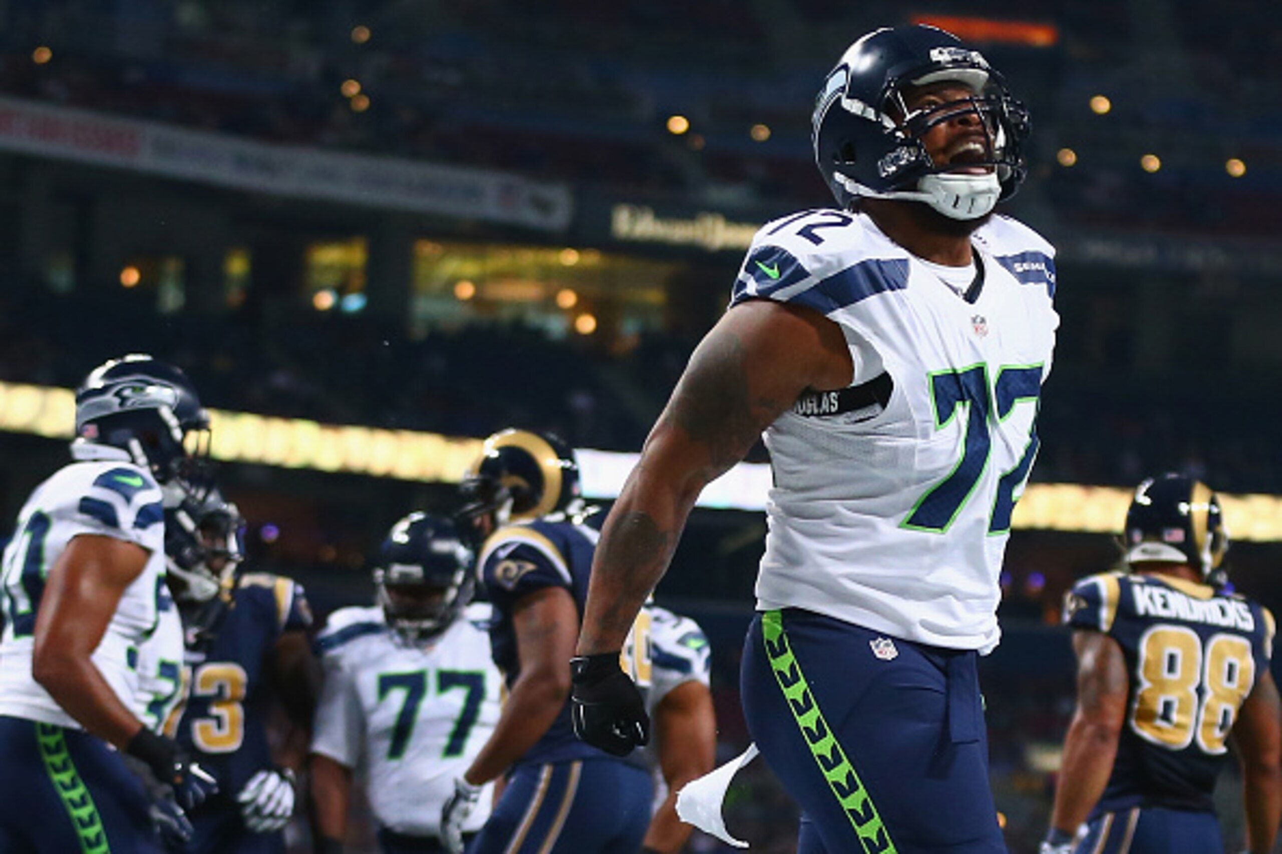 Michael Bennett turned in a superb performance against St. Louis, but couldn't escape questions about Kam Chancellor.