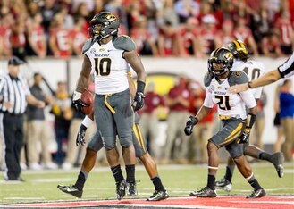 Missouri LB Kentrell Brothers and S Ian Simon