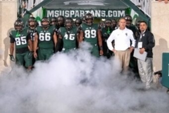 Michigan State HC Mark Dantonio (right)