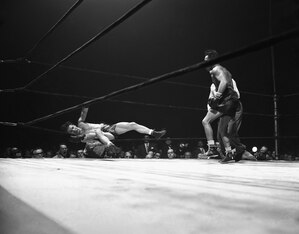 Armstrong (right) was a brutal puncher.