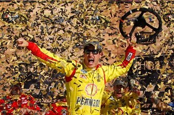 Joey Logano winning at Kansas in 2014.