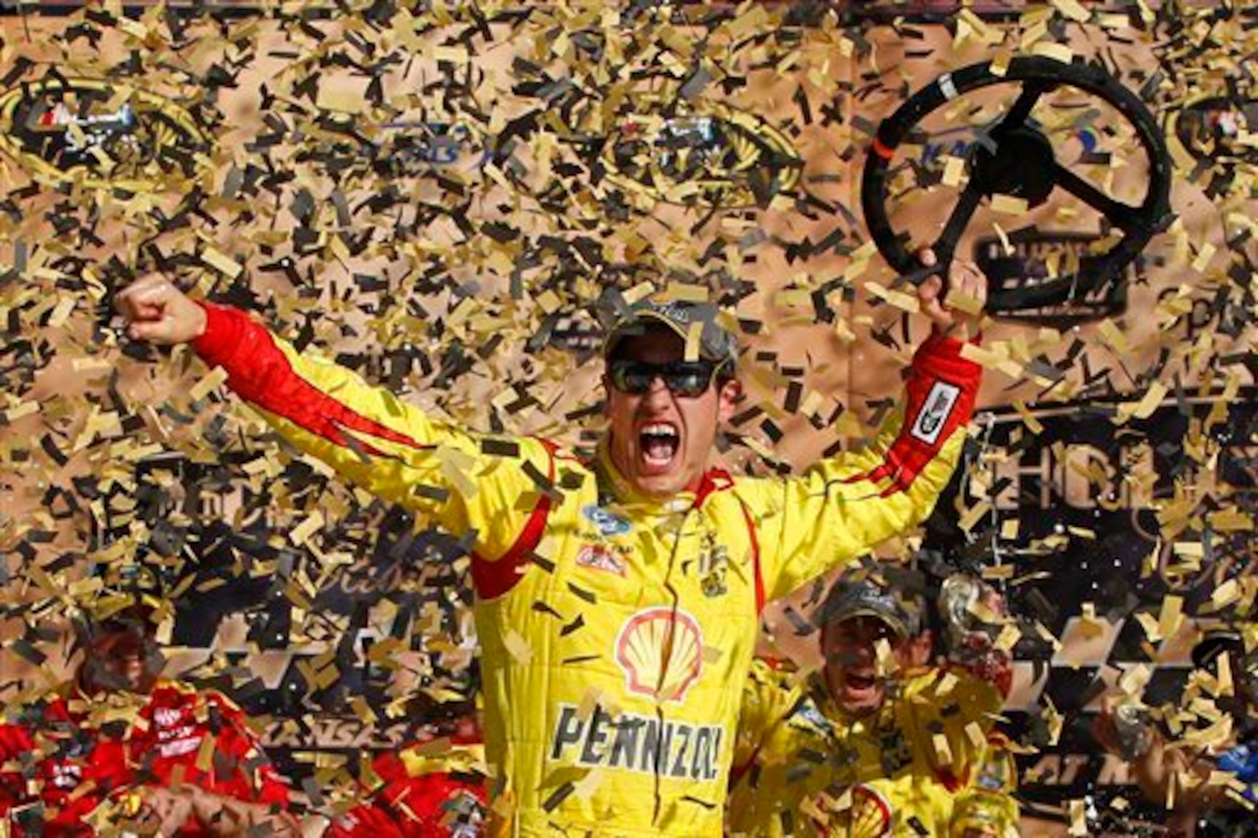 Joey Logano winning at Kansas in 2014. Joey Logano winning at Kansas in 2014.