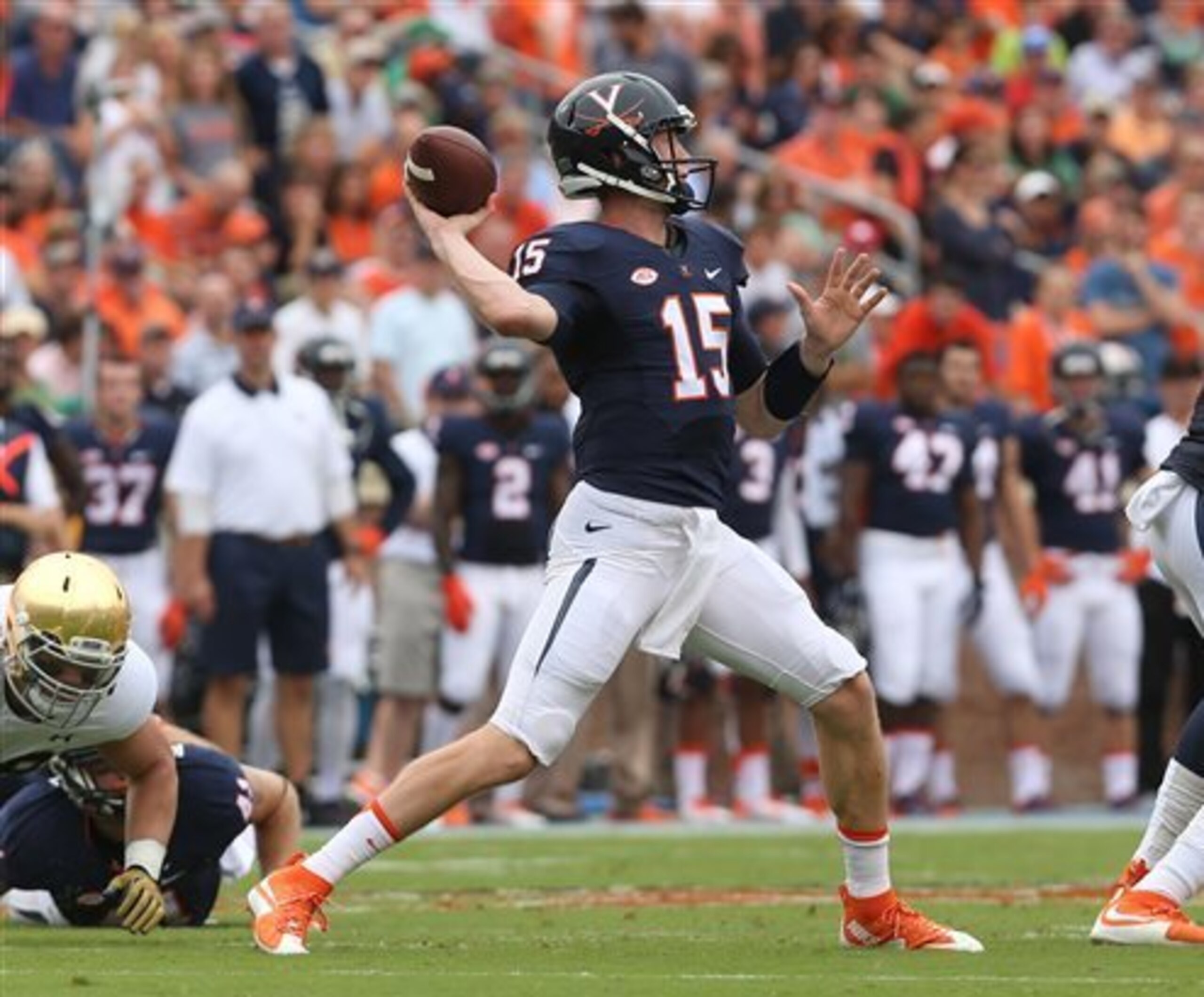 Johns unleashing a pass downfield. Johns unleashing a pass downfield.