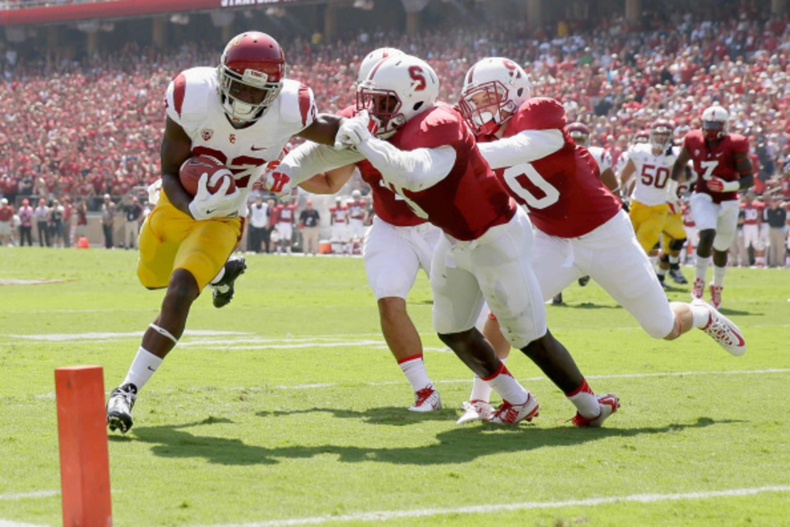 USC RB Justin Davis (left) vs. Stanford in 2014